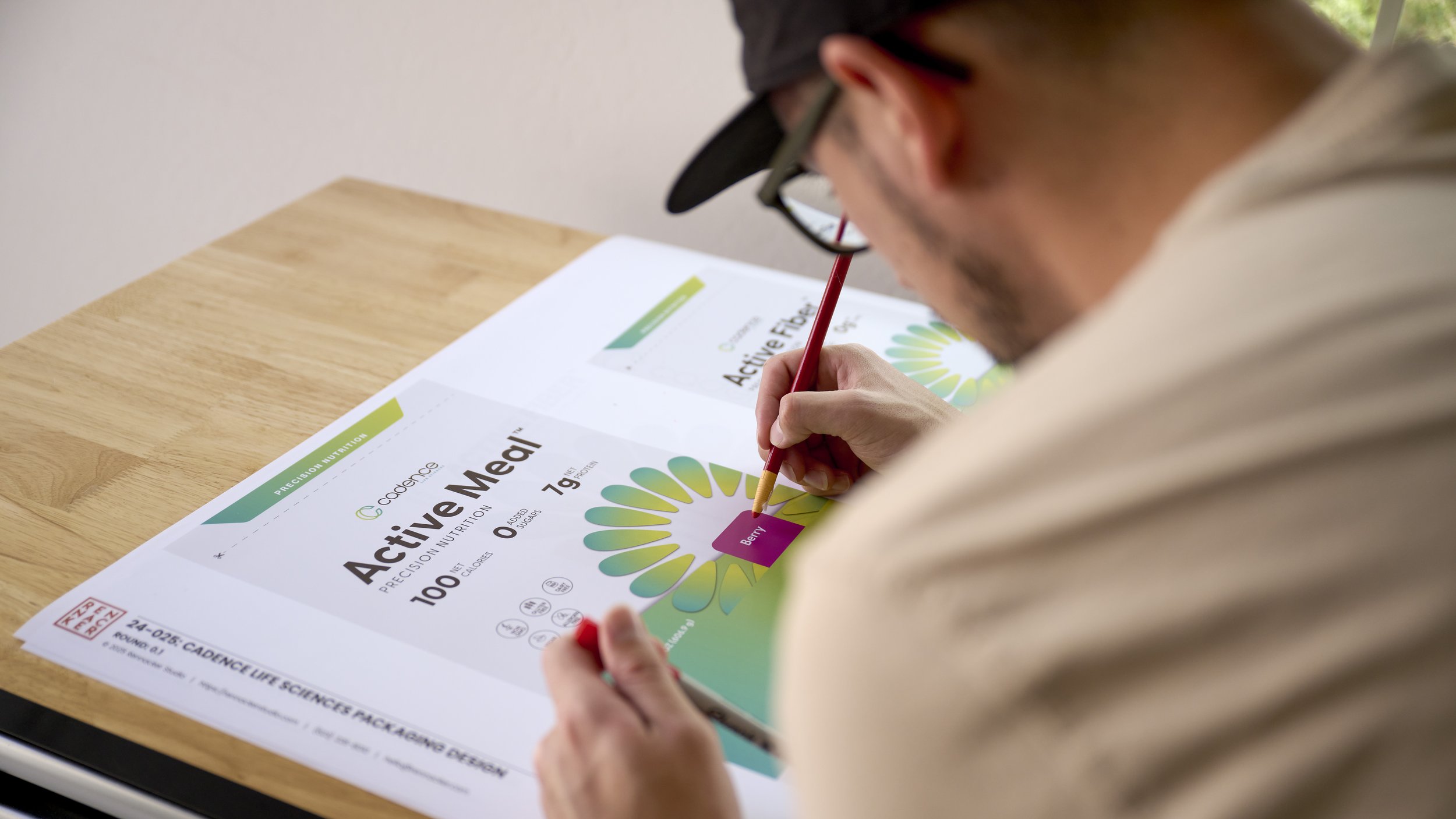 Designer marking changes on Active Meal packaging proof