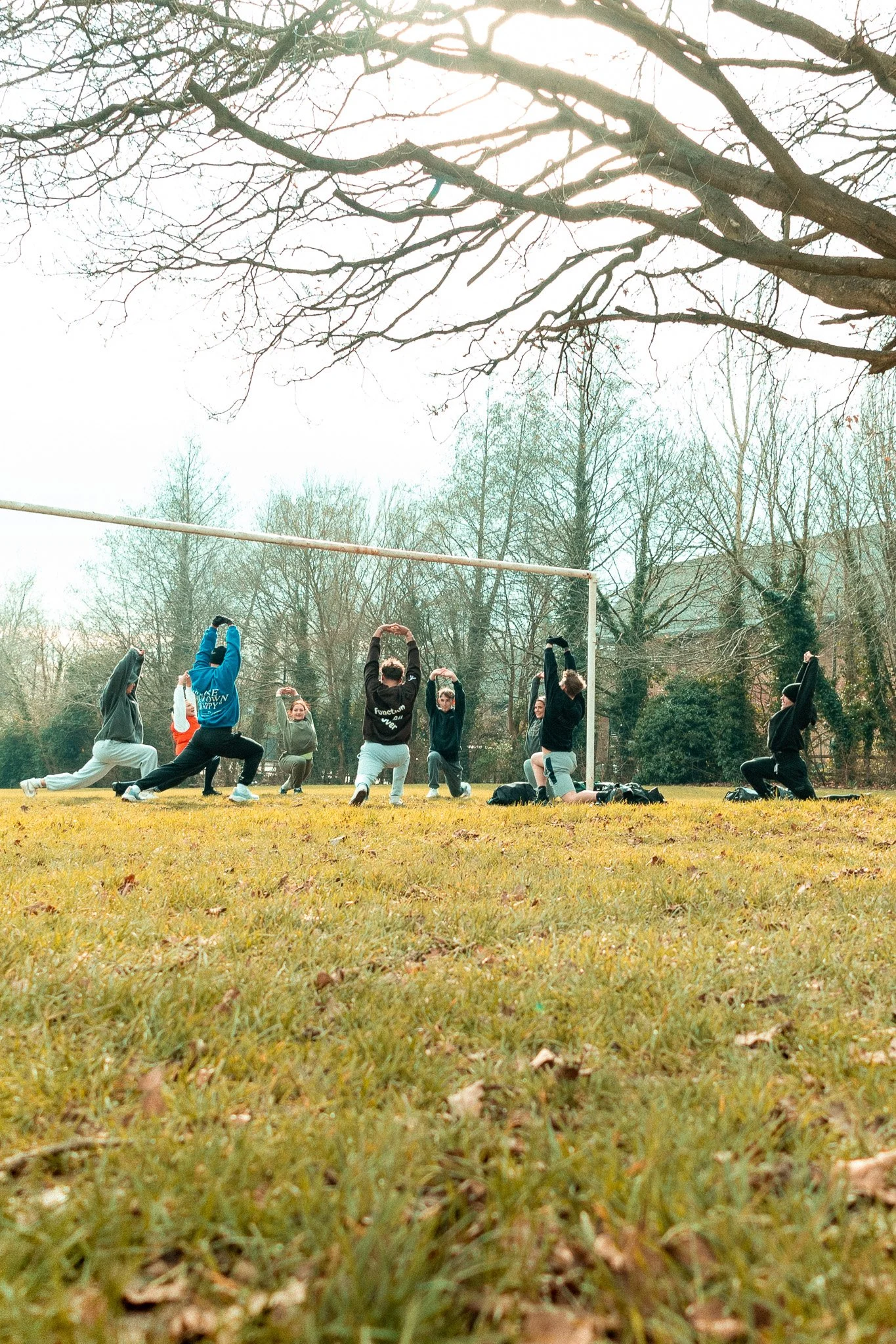 Athletes warming up on a field