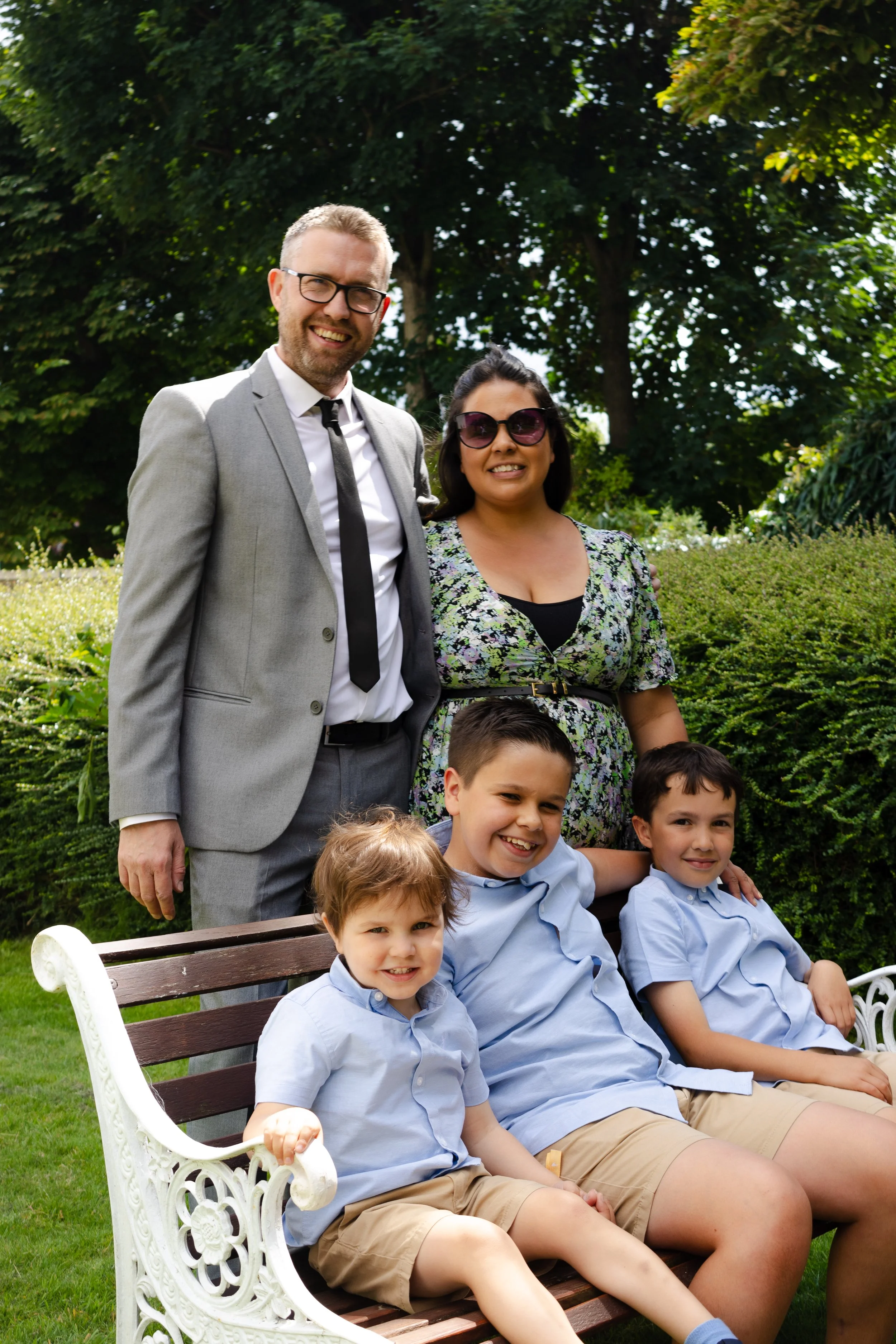 Family sat together at christening