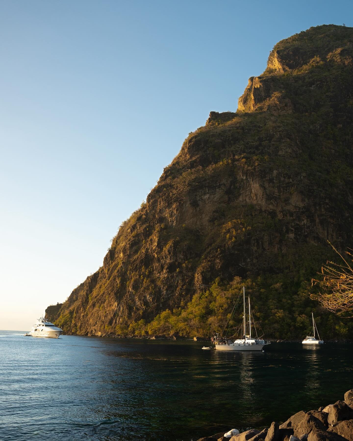 The beautiful pitons of St Lucia, shot at sunset from @sugarbeachviceroy 🌞🌊