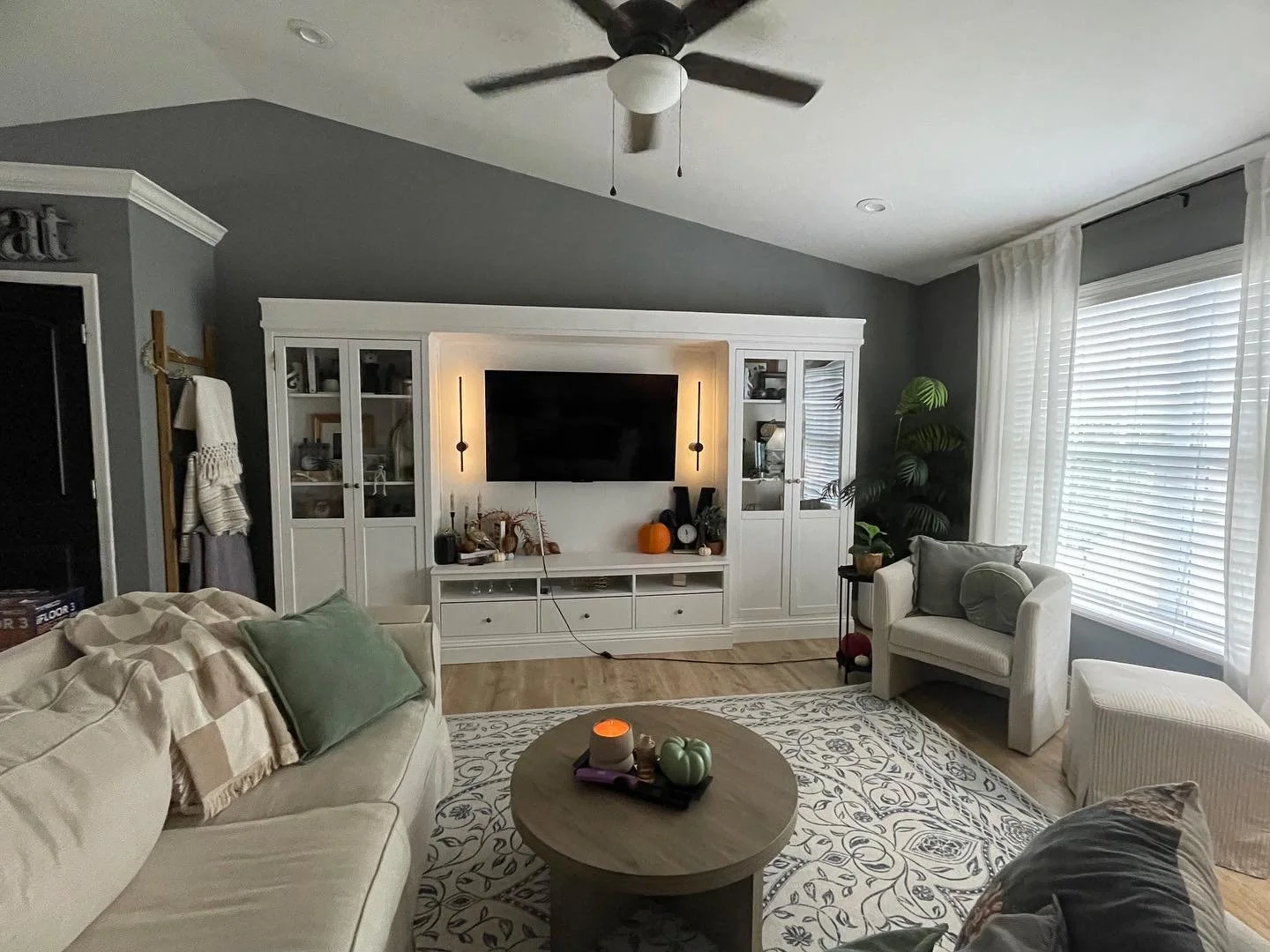 Check out this transformation! 
I worked with this customer to transform her media wall into something more impactful and what better way then to use her existing IKEA bookcase cabinets and transform this into a customized &ldquo;built-in&rdquo; look