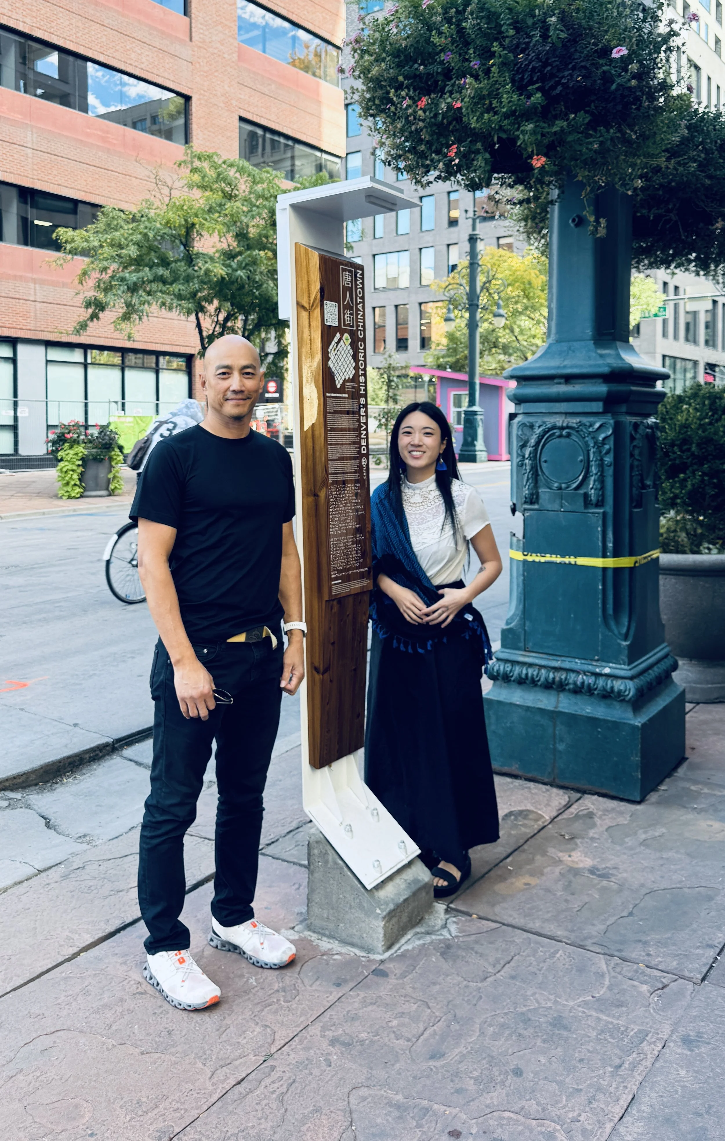 Ben (Board Member) and Joie (Executive Director) standing with our historical marker