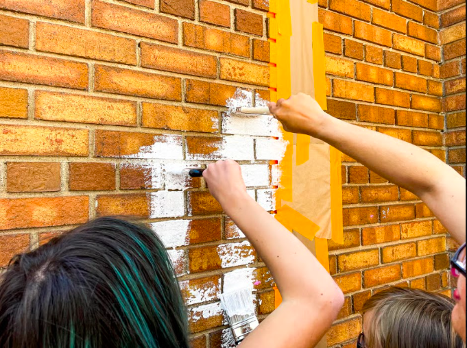Denver’s Asian American community lays primer for mural dedicated to city’s historic Chinatown