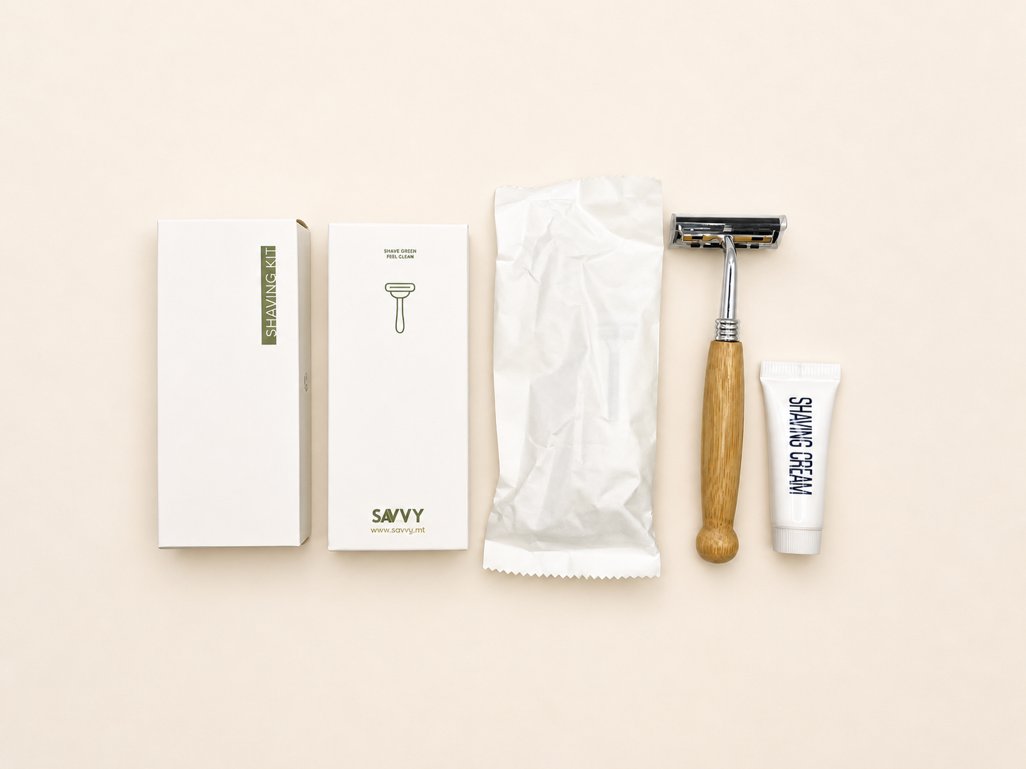 Savvy shaving kit with razor, wooden handle, shaving cream, and packaging