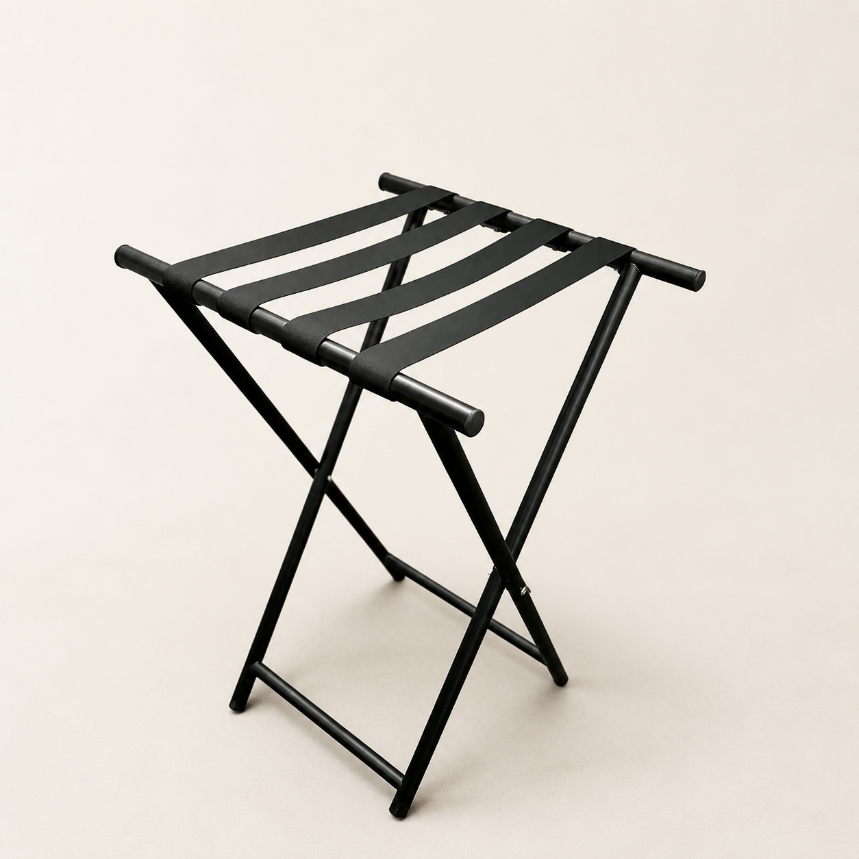 Black folding luggage rack with four fabric support straps
