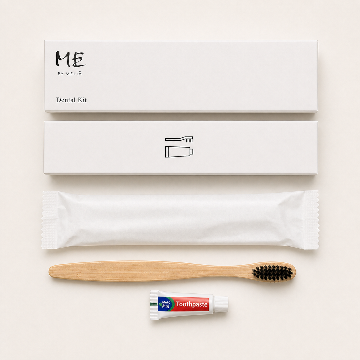 Meliá dental kit with toothbrush, toothpaste, and wrapped toiletry packet