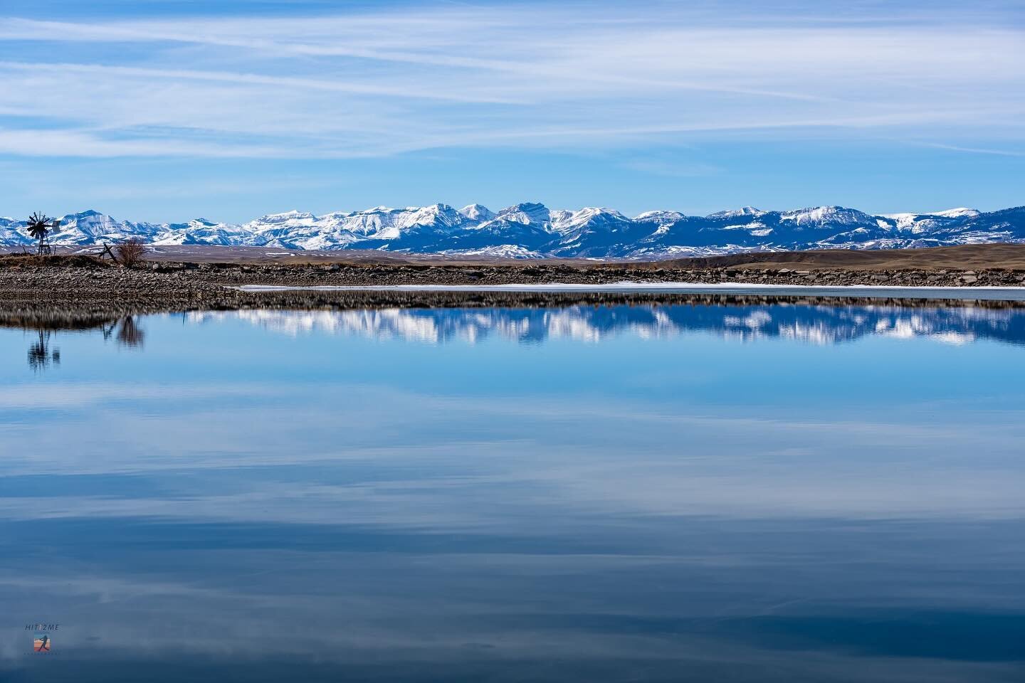 @pachek_yoself and @jeanclaudegoddamme made it out to a small lake on Friday to try out hand at some early spring fly fishing.  It was such an amazing day outside.

I loved the way the Rocky Mountains reflect off the lake in the mid day sun

#rockymo