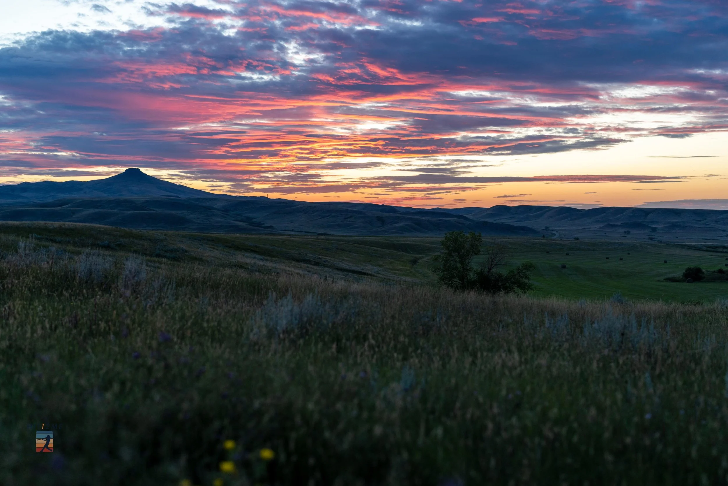 Continuing reviewing older photos.  I took this sunset photo while out fishing with Dave last summer.  I really liked the cloud characteristics and colors. #sonyalpha #sonya1 #sony50mmf14