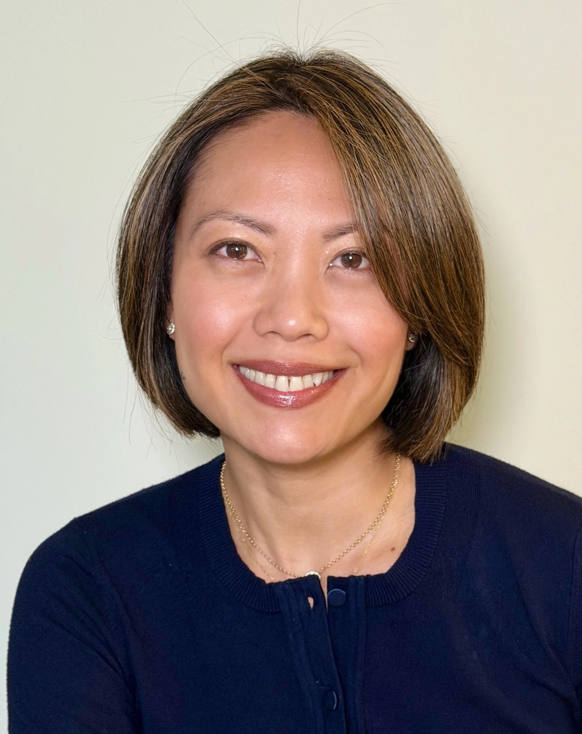 Dianne Goette, professional executive coach and licensed psychotherapist, smiling.