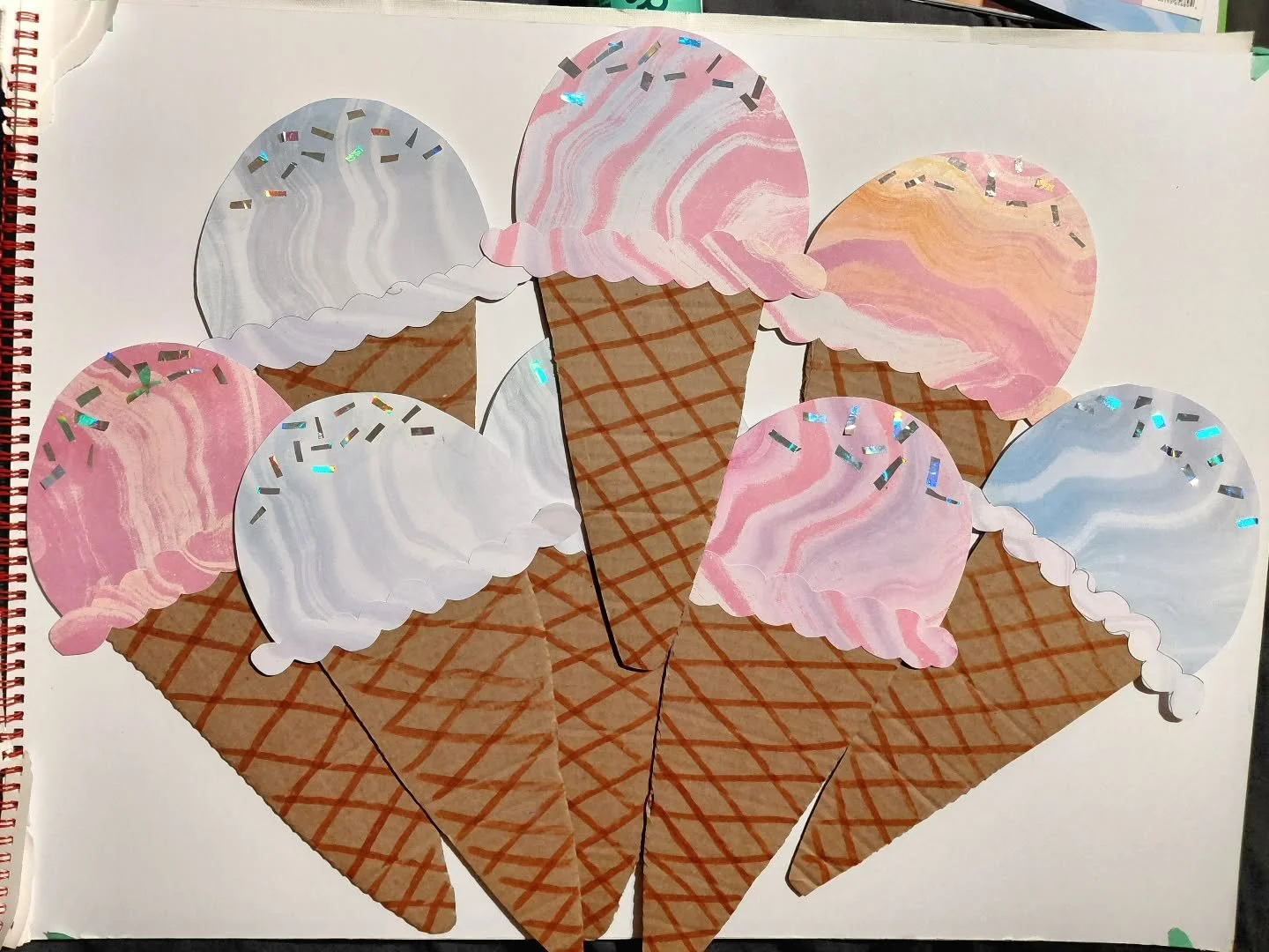 felt like getting creative so i made some decorations for tomorrow's back to school ice cream social. the holographic table cloth is really going to pop.