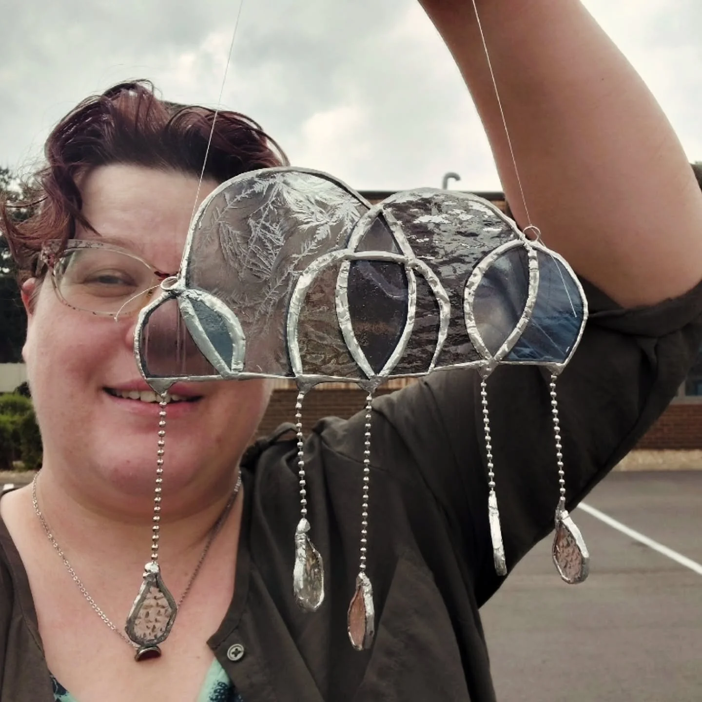 🩶🌧🩶 me and my rain cloud 🩶🌧🩶 

Some folks have asked about the class. I went to a place called The Artery Glass Studio in Anoka and the class was $30 + the cost of the kit ($20). This was the design i chose. The glass is precut, but you do the 