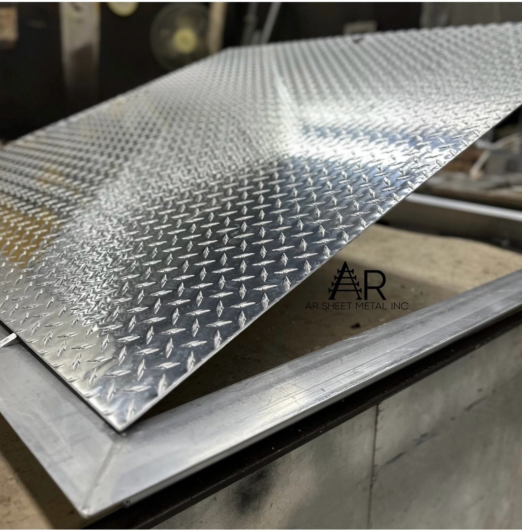 Need a custom solution? We&rsquo;ve got you covered.
 
This diamond plate access hatch was fabricated to meet exact project requirements, delivering both function and a clean finished appearance.
⚒️AR Sheet Metal Inc.⚒️
📞Office 718-387-2473
📲Sales 