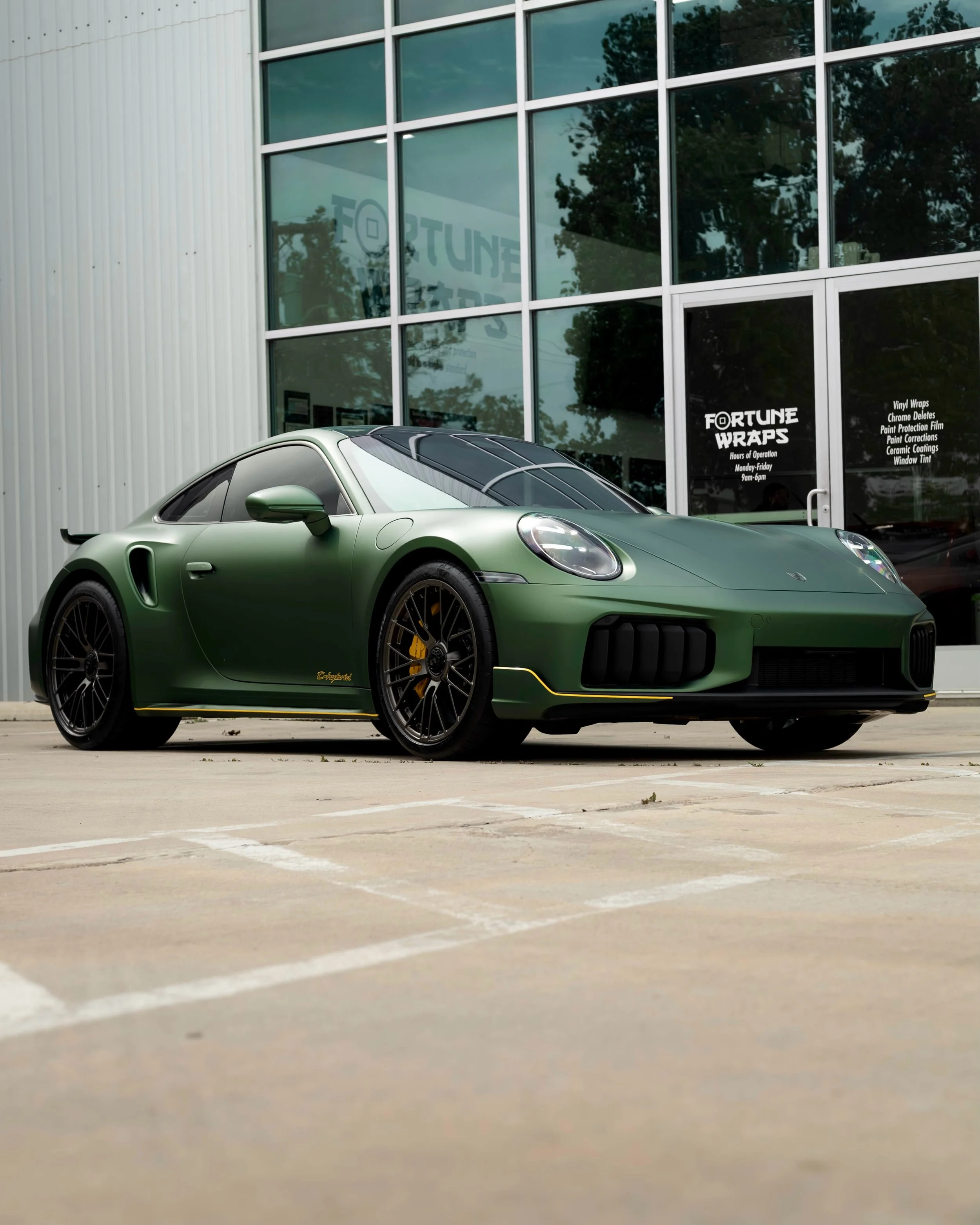 Here&rsquo;s a nice set of photos Zach shot of the 2026 Porsche 911 T-hybrid we recently finished up. Full wrap with door jambs in Pine Green with yellow accents, full window tint, windsheild protection film, and custom decals for this beauty👌