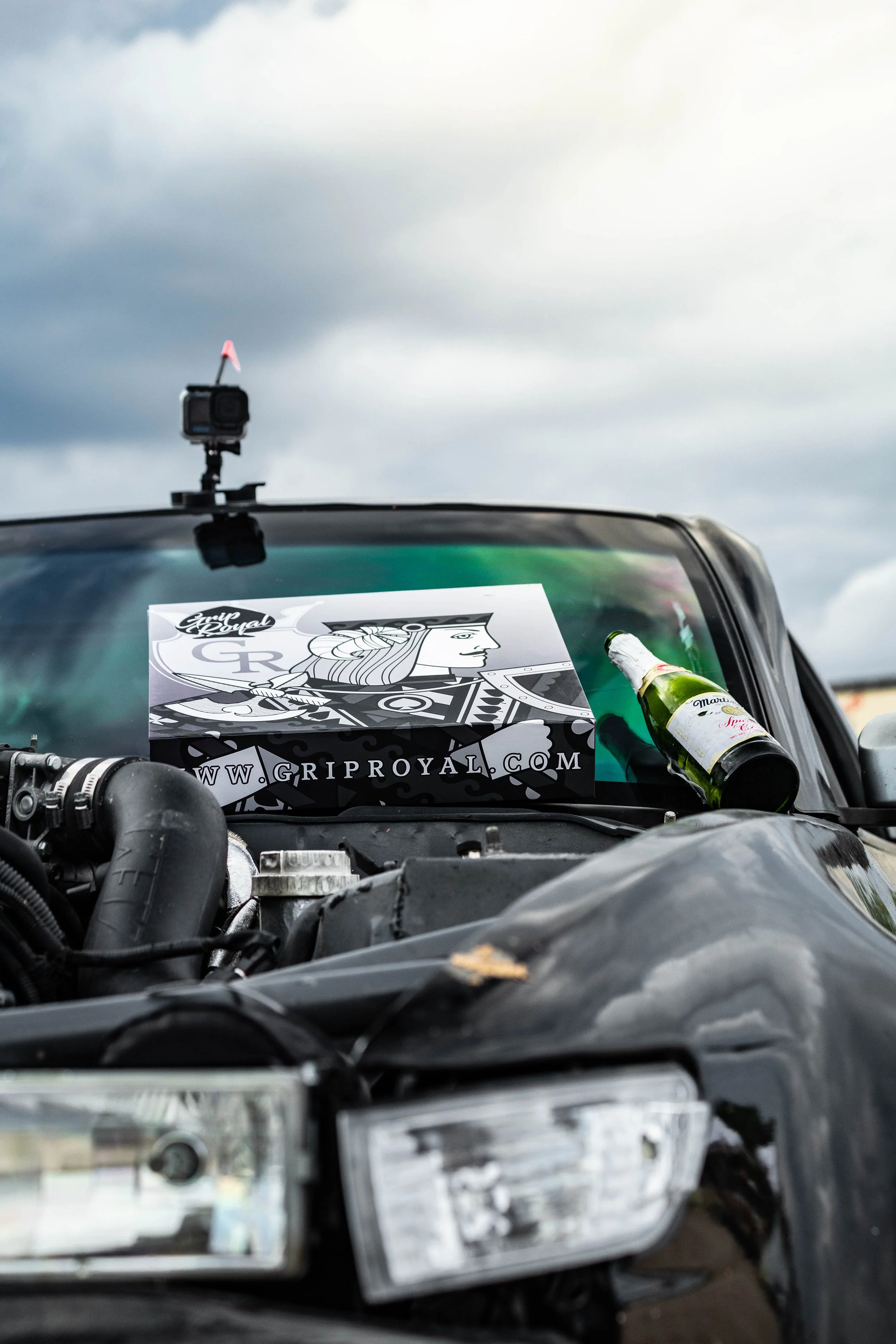 Brians 240sx drift car with his trophy propped on the window