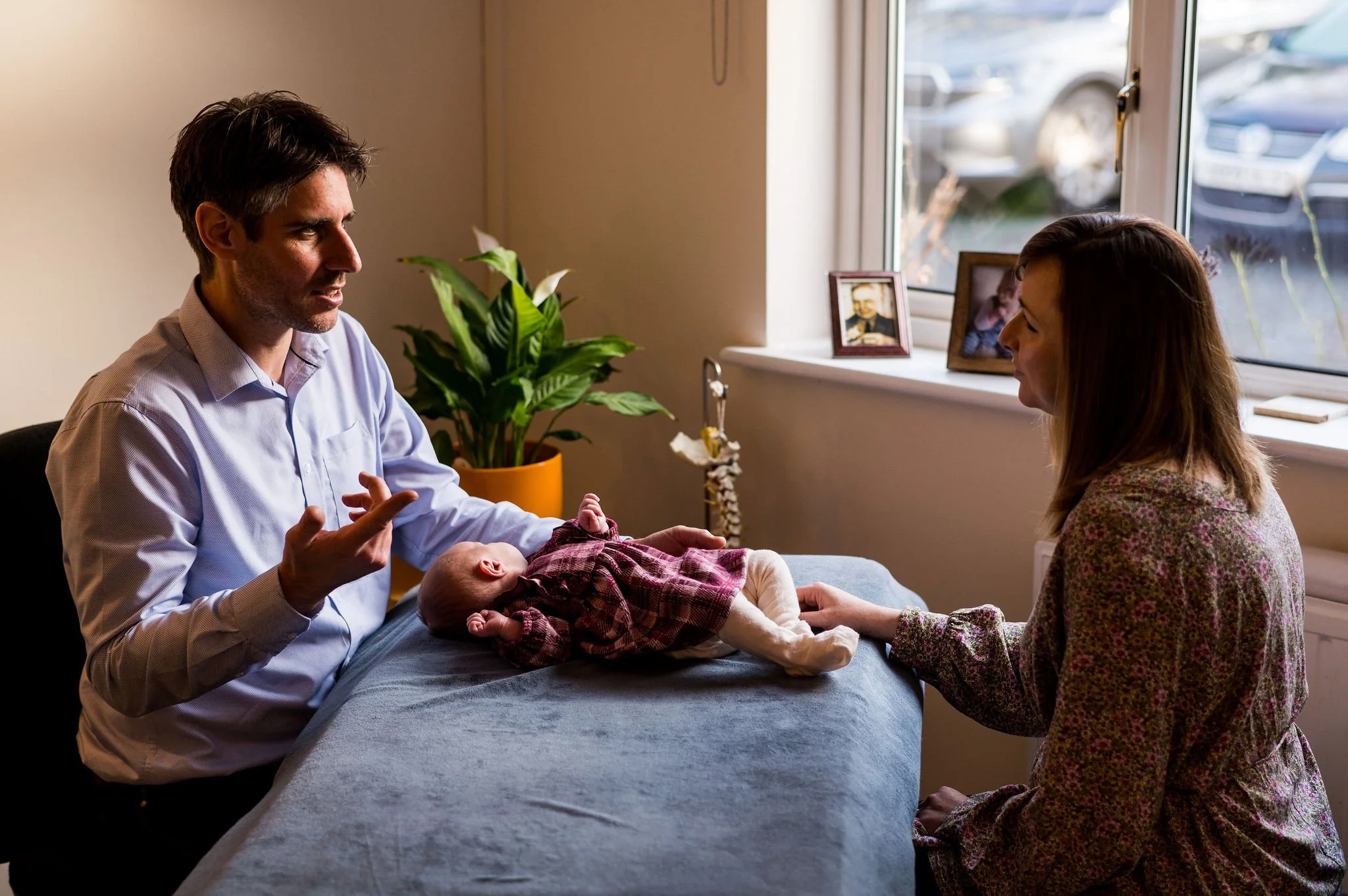 osteopath giving advice to talking to Mum