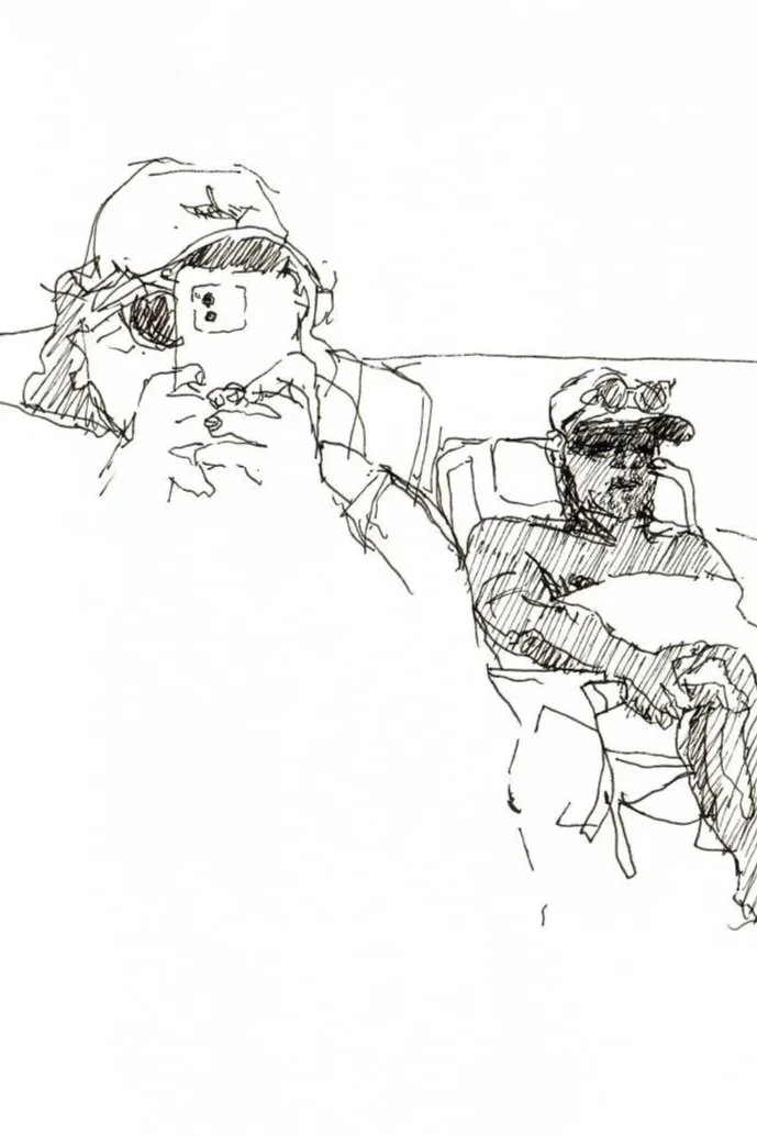 Juliana taking pic of me drawing her