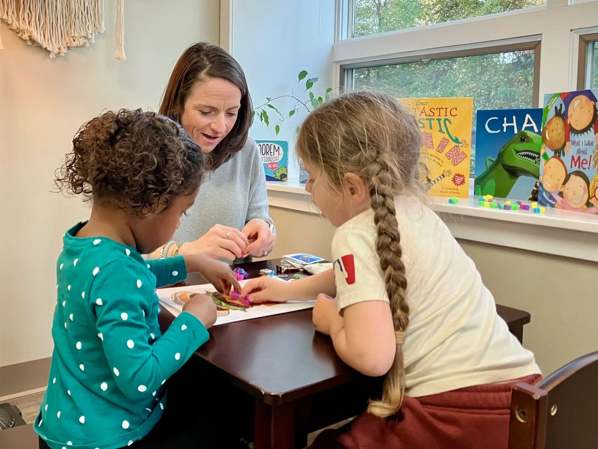 Preschool children in a group speech therapy session led by a licensed SLP in Hatboro, PA, focusing on social communication and language development.