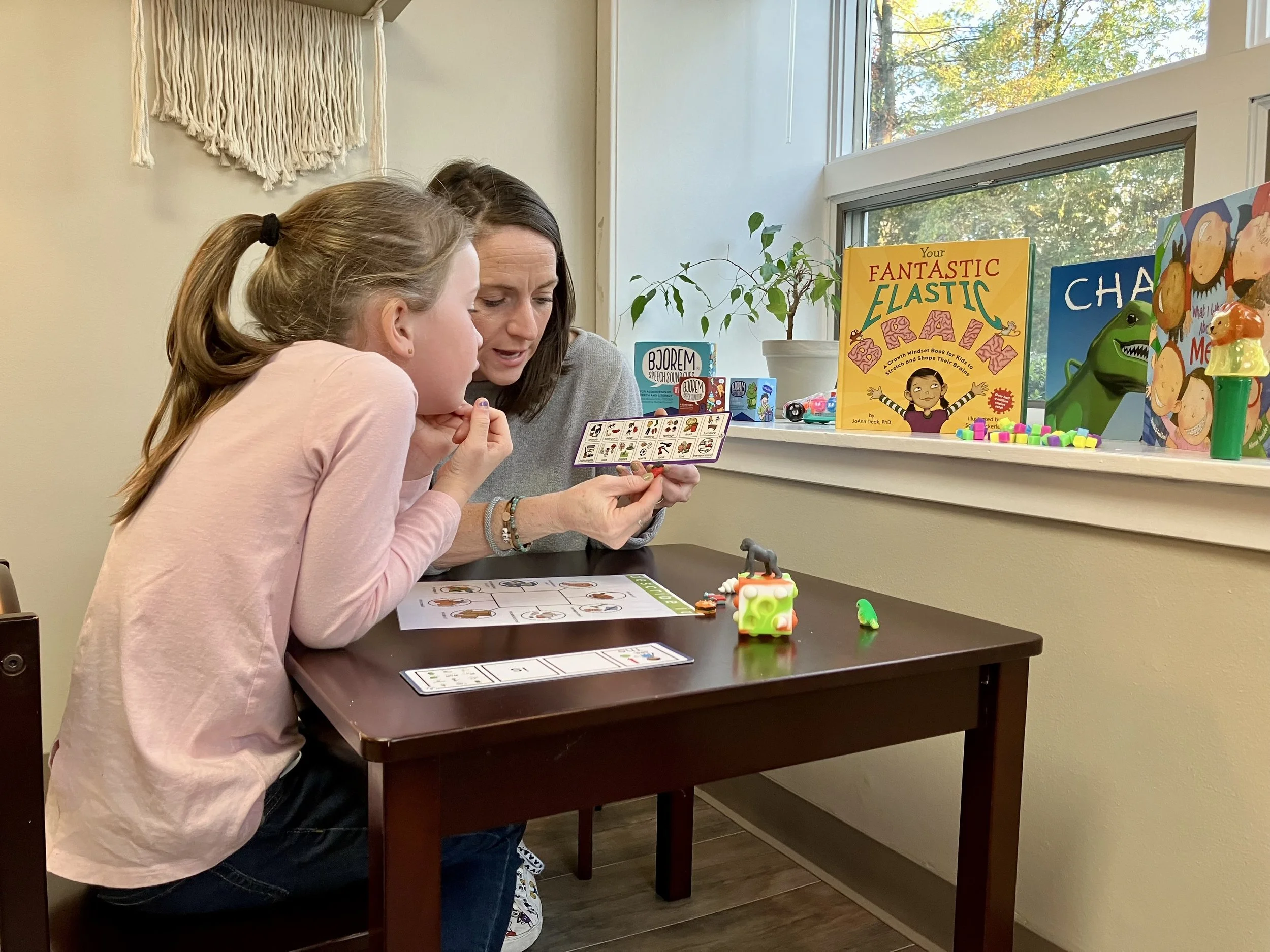 Speech-language pathologist providing one-on-one pediatric speech therapy in Hatboro, PA, helping a child improve communication skills.