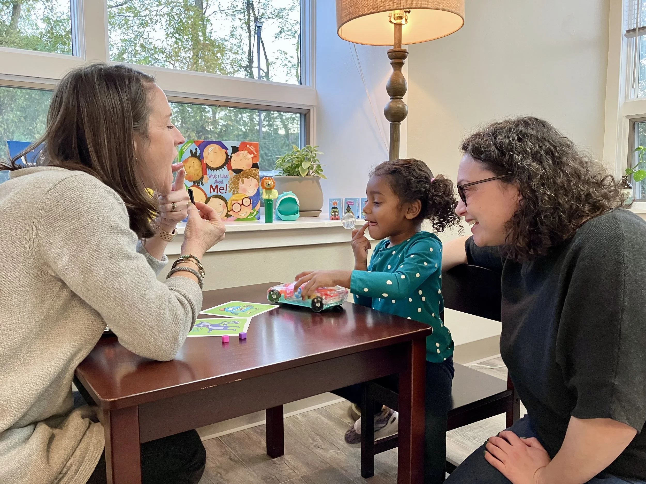 Toddler and her mother participating in a pediatric speech therapy session in Hatboro, PA with a licensed SLP for early language development.