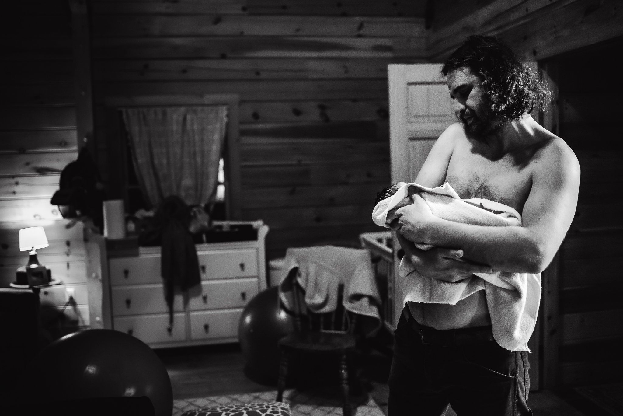 First-time-father-holds-newborn-skin-to-skin-after-central-PA-birth