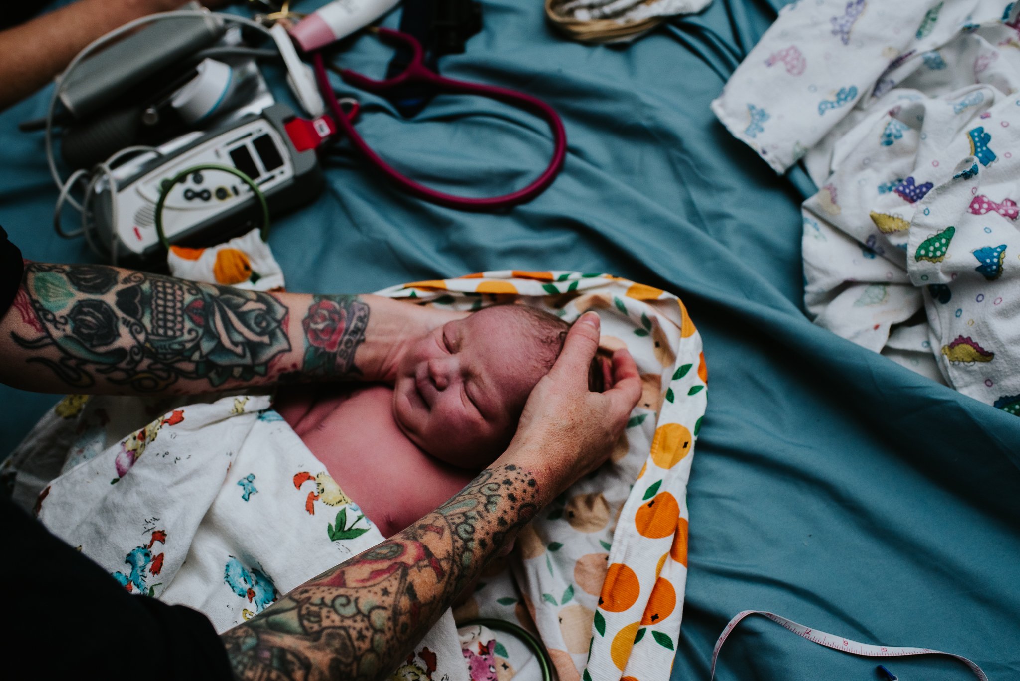 Newborn-exam-documented-by-Badger-and-Quill-Photography
