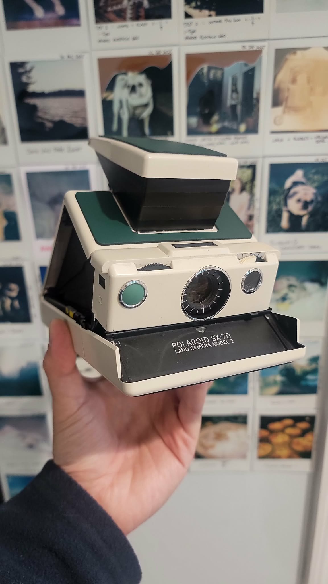 Refurbished CLA Ivory Polaroid SX-70 with SX70R PCB and green leather skin replacement by Polastudio