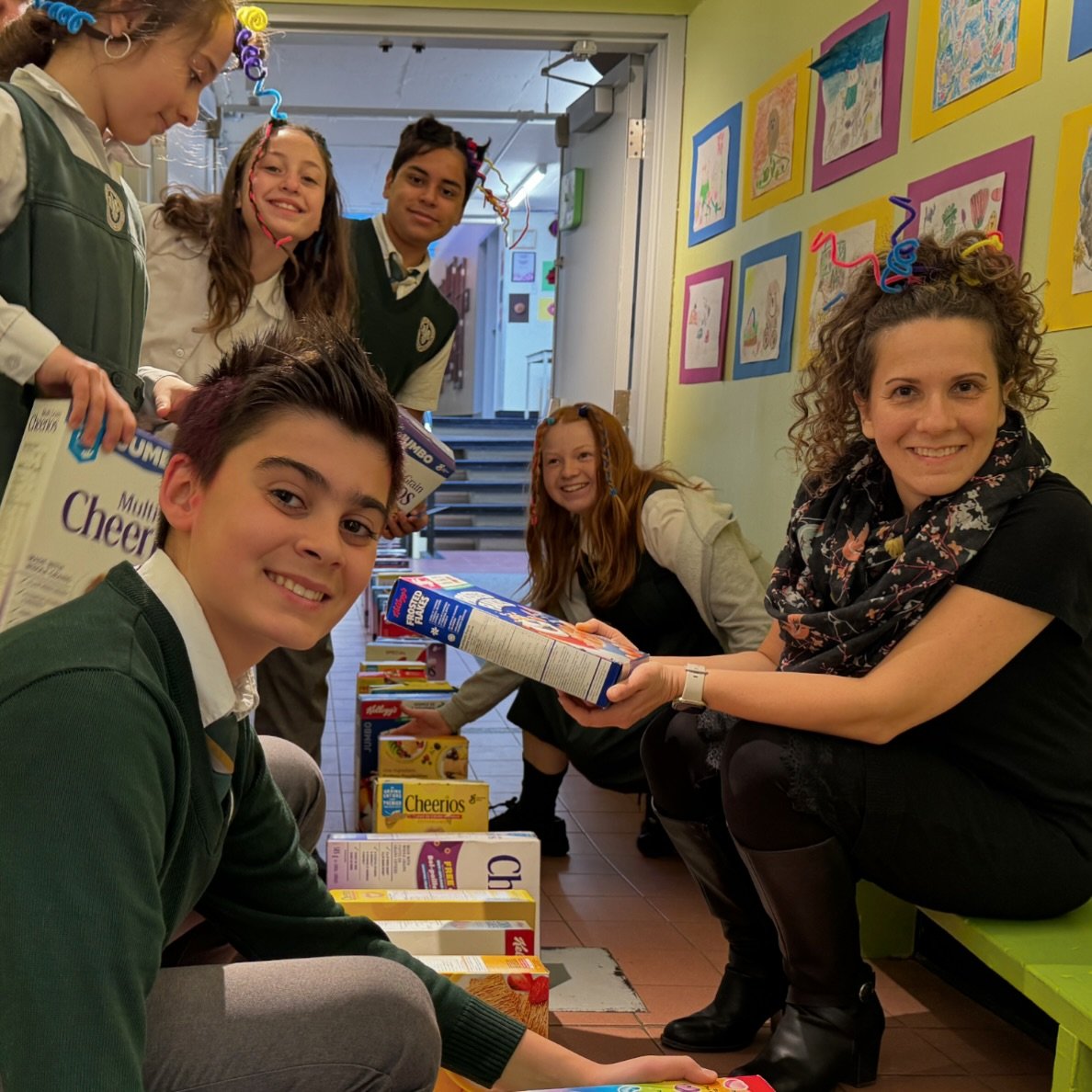 Yesterday, marked a special day at The Priory with the successful hosting of our cereal drive and crazy hair domino day. The student council took great care in placing 198 cereal boxes along the corridors and down the stairs, creating an exciting dom
