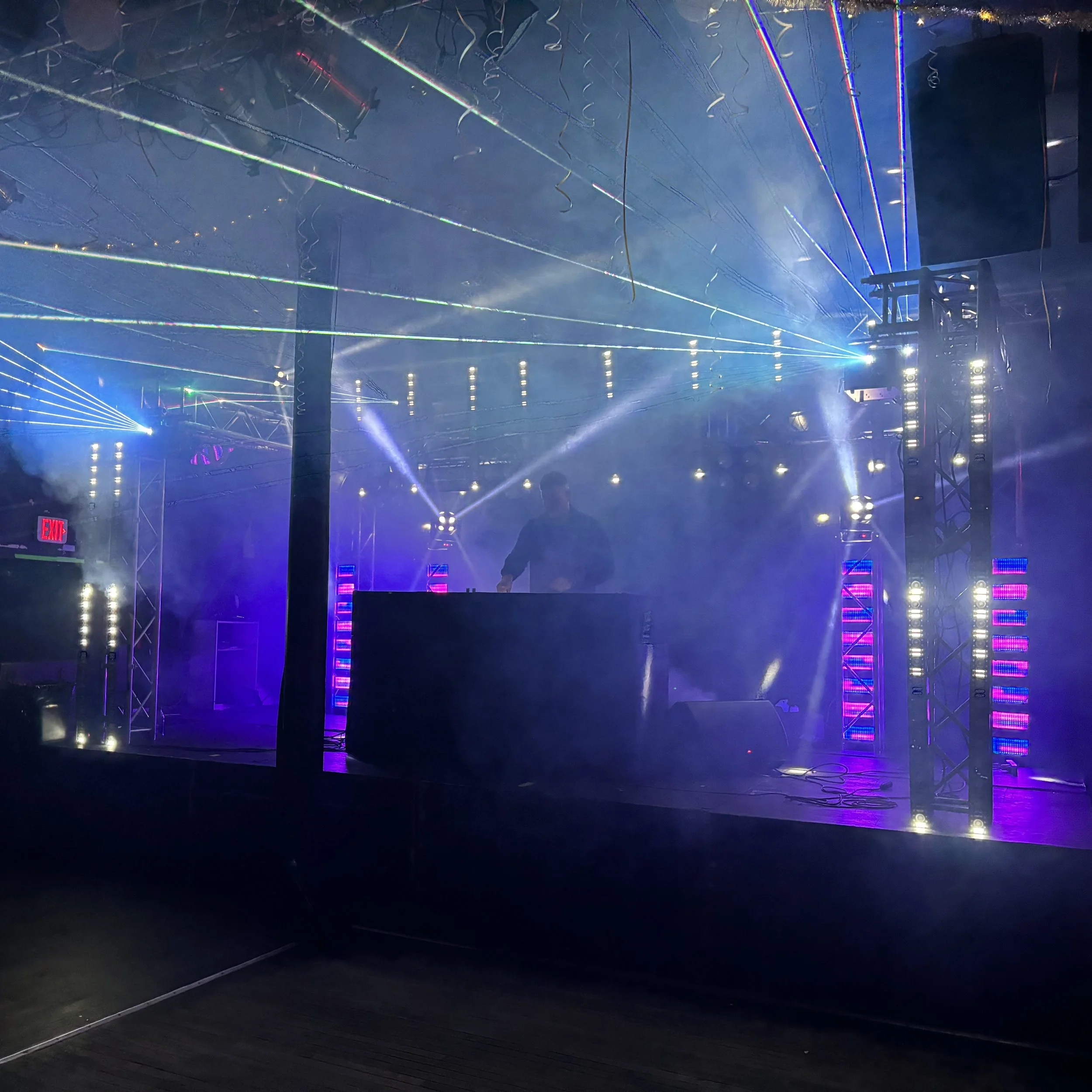 DJ BIG S performing on a stage at Tide & Boar Ballroom in Moncton, NB, Canada.