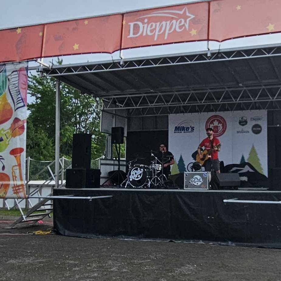 Phil Athanase and Denis Hachey of Big Bad Party Band performing outdoors in Dieppe, NB, Canada.