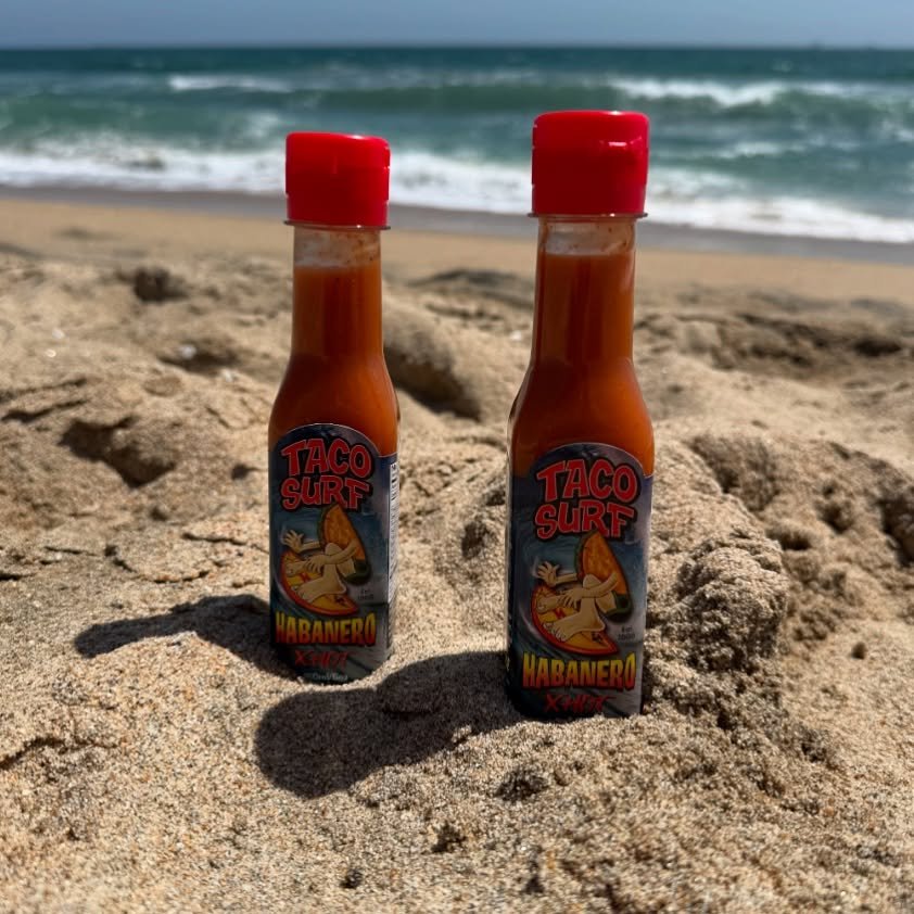 Turn up the heat! 🌶️ 

Our signature Taco Surf habanero hot sauce adds the perfect kick to any bite. 

Grab a bottle to take home the next time you dine in with us or order some online and we will ship the heat straight to your house. 🤙