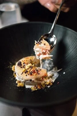 A beautifully styled plate of food with a spoon, showcasing client work by Midnight Creative Agency, a top Las Vegas marketing agency.