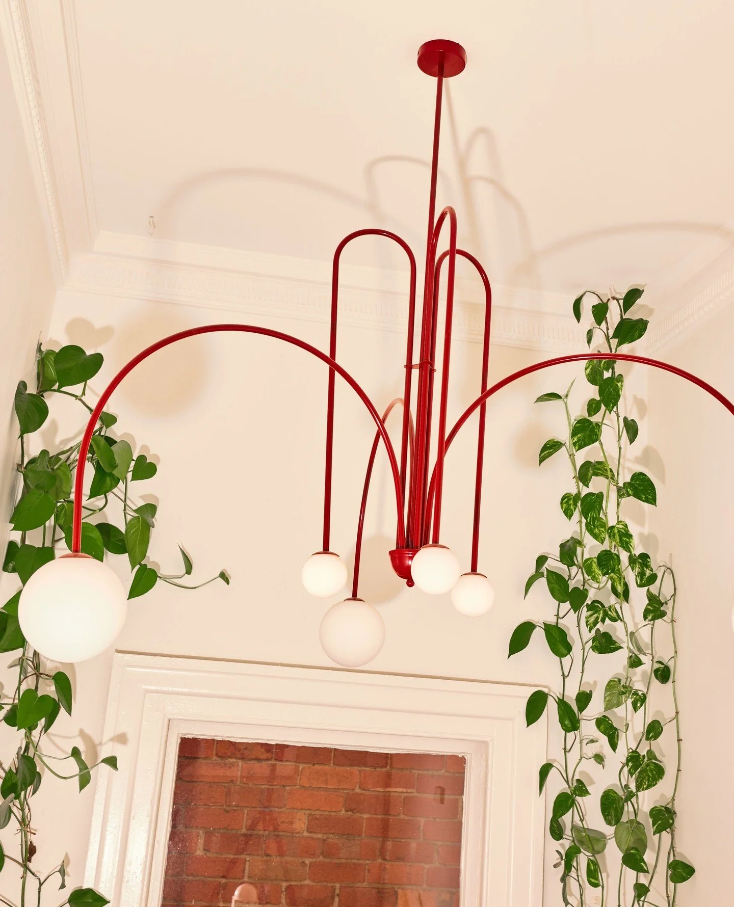Red, radiant, and impossible to ignore ❤️ This pendant brings a flash of drama to the stairwell at Osteopathic Sense.⁠
⁠
Location: Fitzroy, VIC⁠
Client: @osteopathic_sense ⁠
Photo: @timhrrs⁠