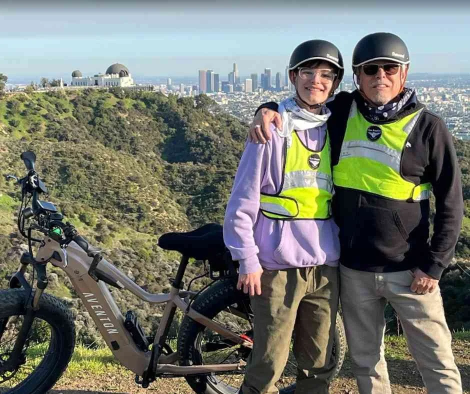 Texas visitors exploring Griffith Park and Griffith Observatory on a guided e-bike tour