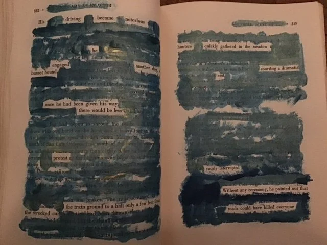 Blue and gold paint on the pages of a book creates a new text.