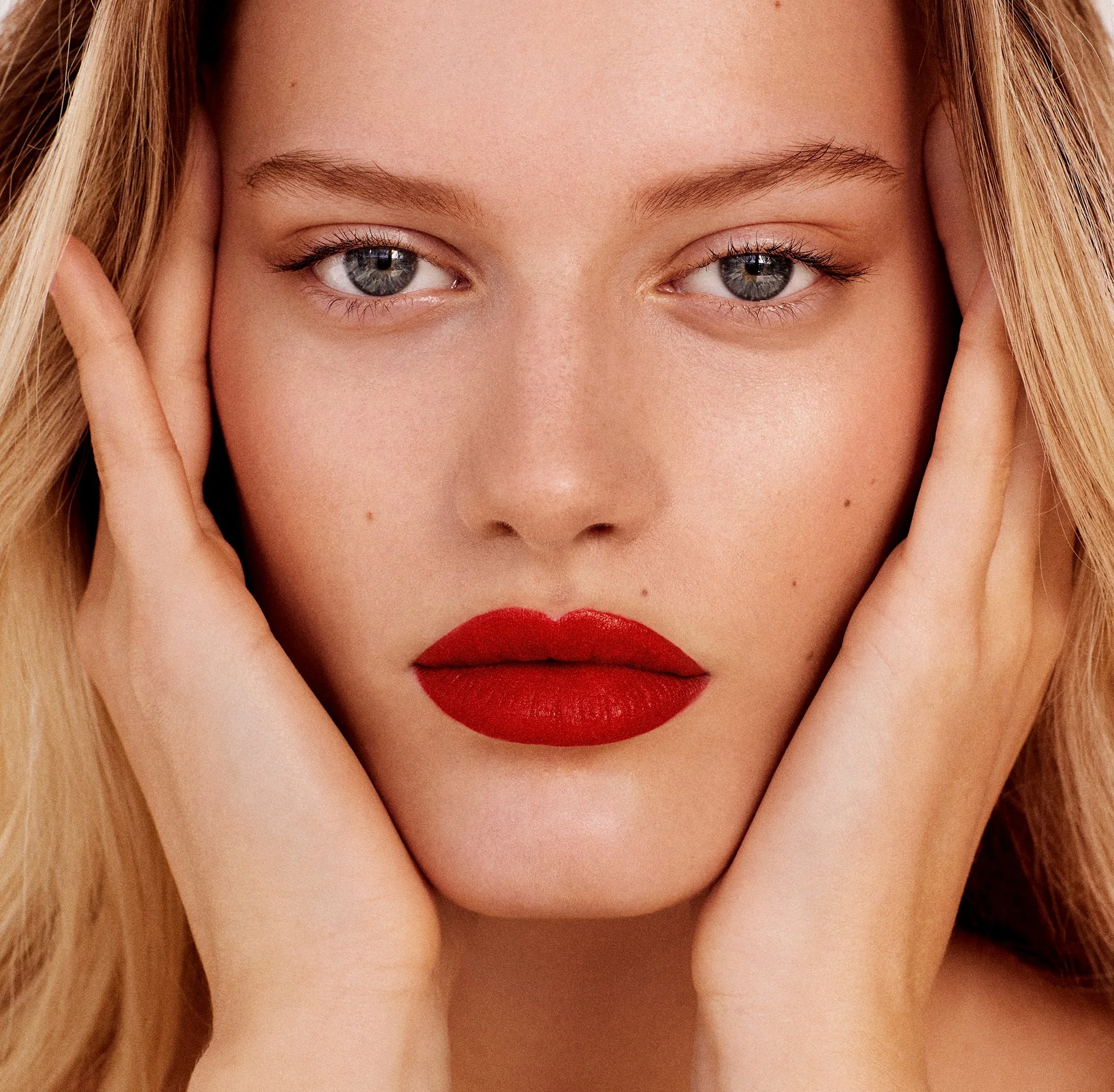 Soft glowing pink makeup beauty portrait by a beauty photographer working across Europe