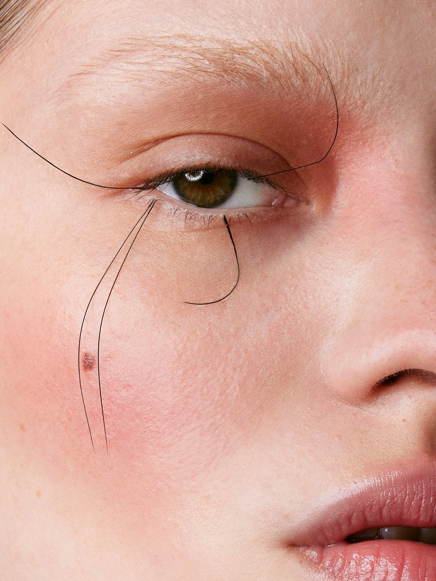Fine graphic eyeliner beauty makeup detail by a beauty photographer working across Europe