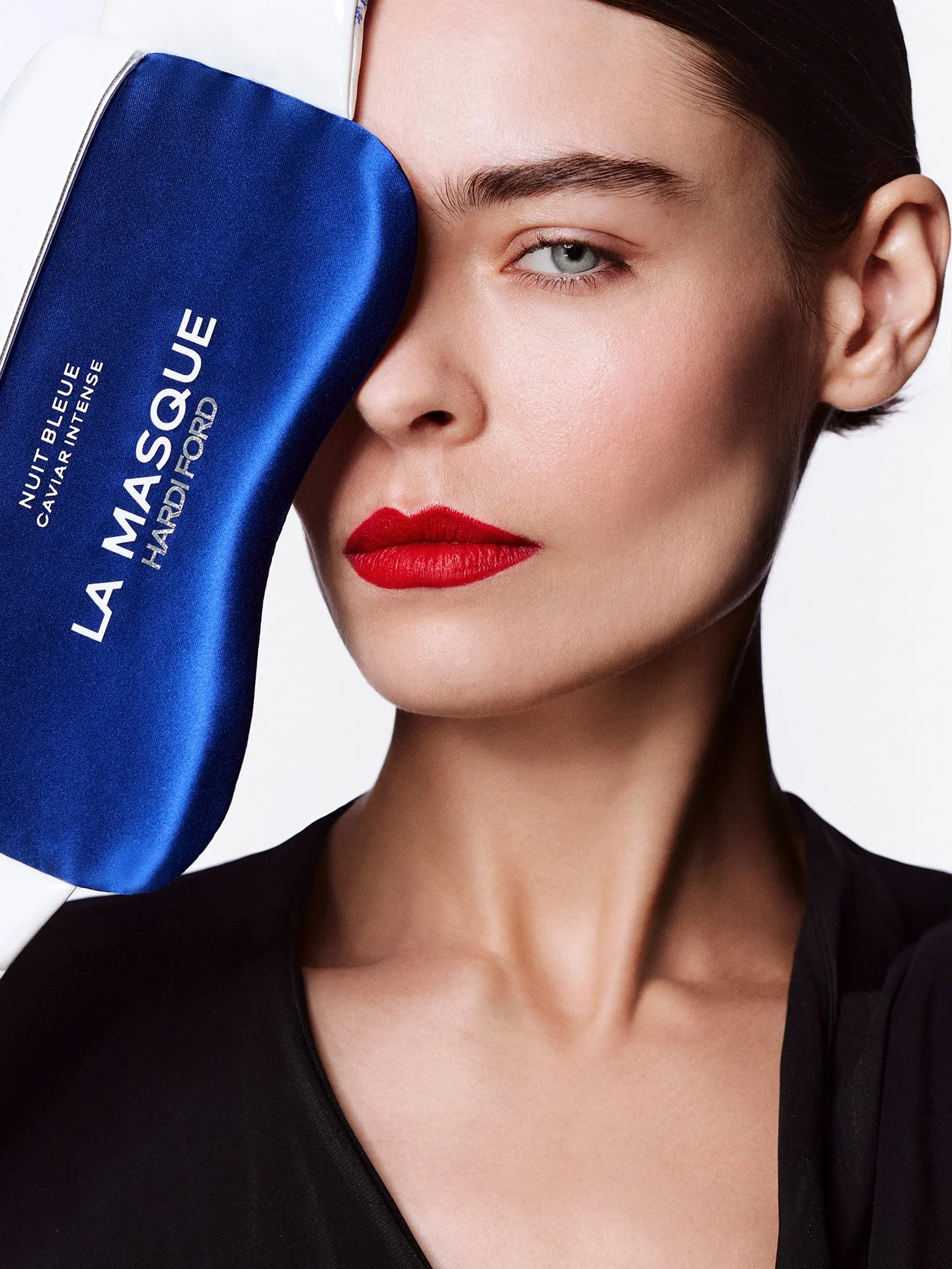 Bold red lip beauty campaign image by a beauty photographer based in London
