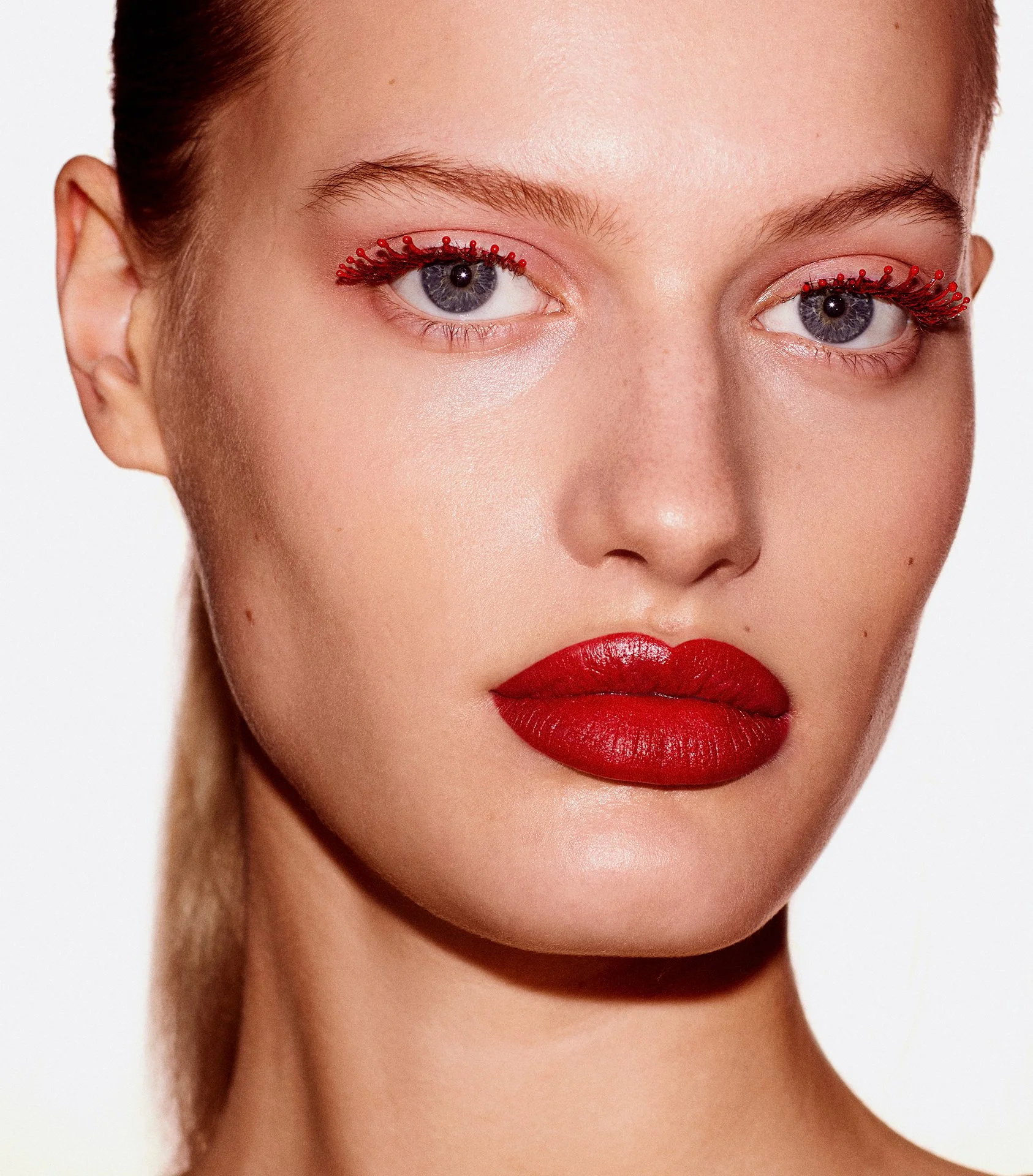 Bold red lips beauty portrait by a beauty photographer based in London