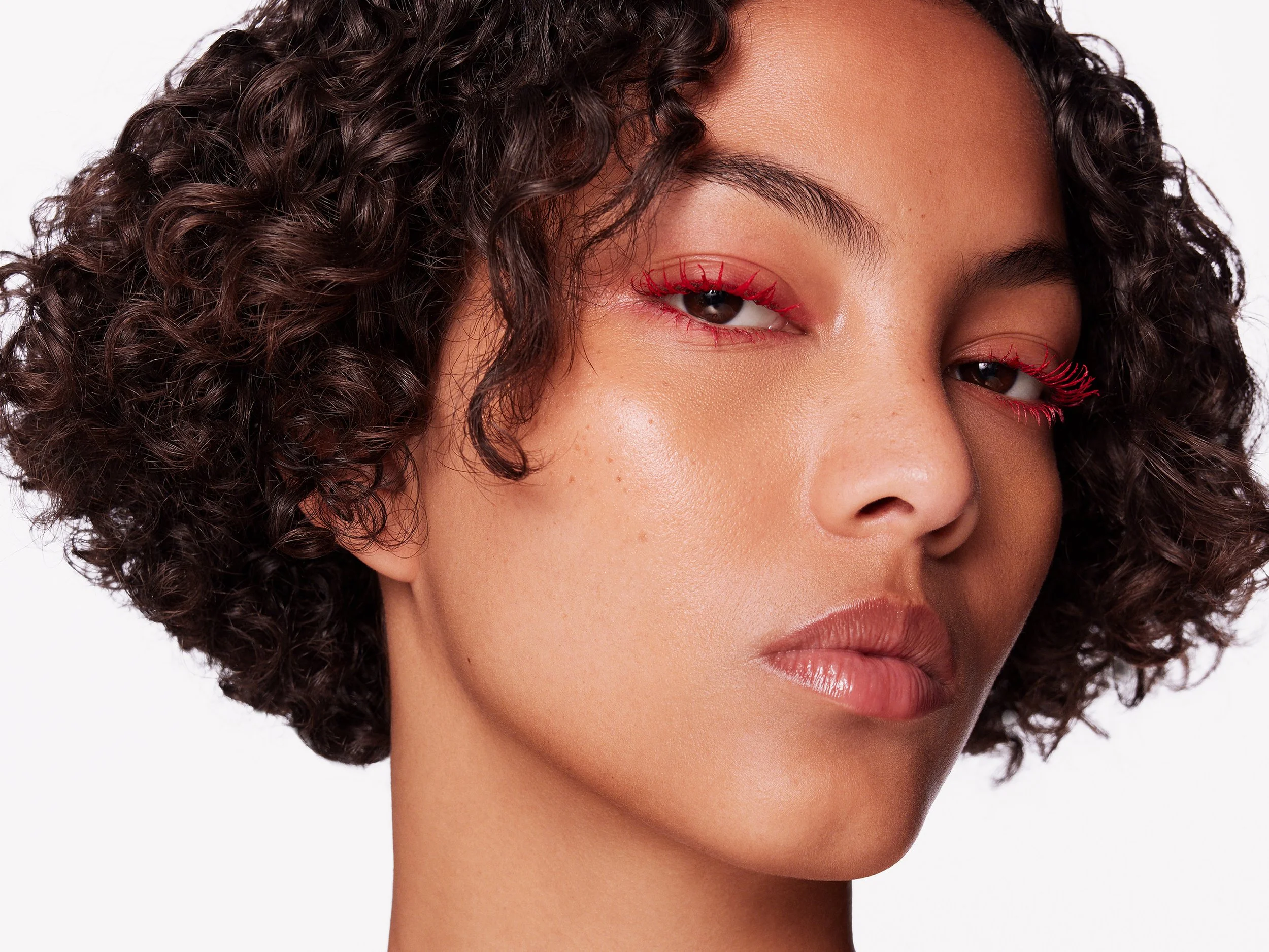 Bold red smokey eye makeup beauty portrait by a beauty photographer based in London