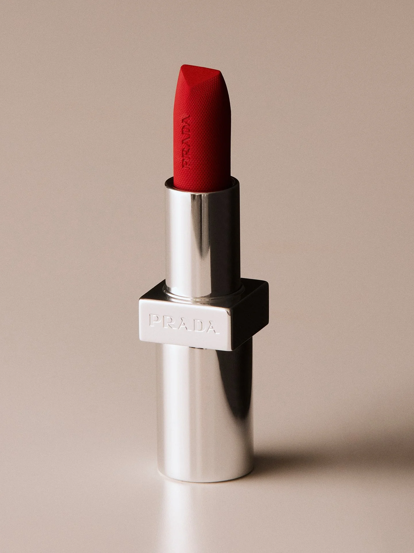 Prada red lipstick product photography by a beauty photographer based in London