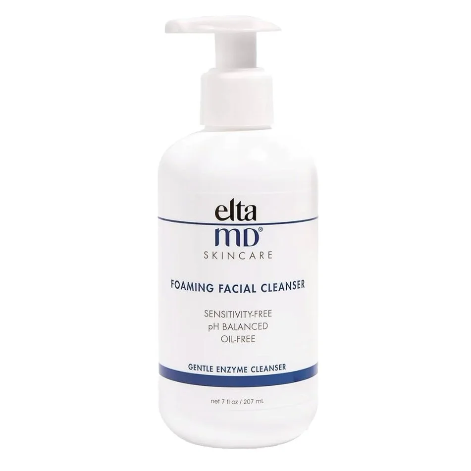 Elta MD foaming facial cleanser bottle with pump dispenser, labeled as sensitivity-free, pH balanced, oil-free.