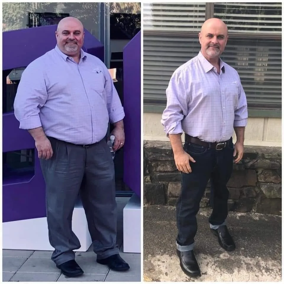 Side-by-side photos of a bald man with a beard wearing a light purple button-down shirt, with different pants and backgrounds. In the left photo, he is wearing dark gray dress pants and black shoes, standing outside near purple panels. In the right photo, he is wearing dark jeans with rolled cuffs and black boots, standing against a stone and window background.