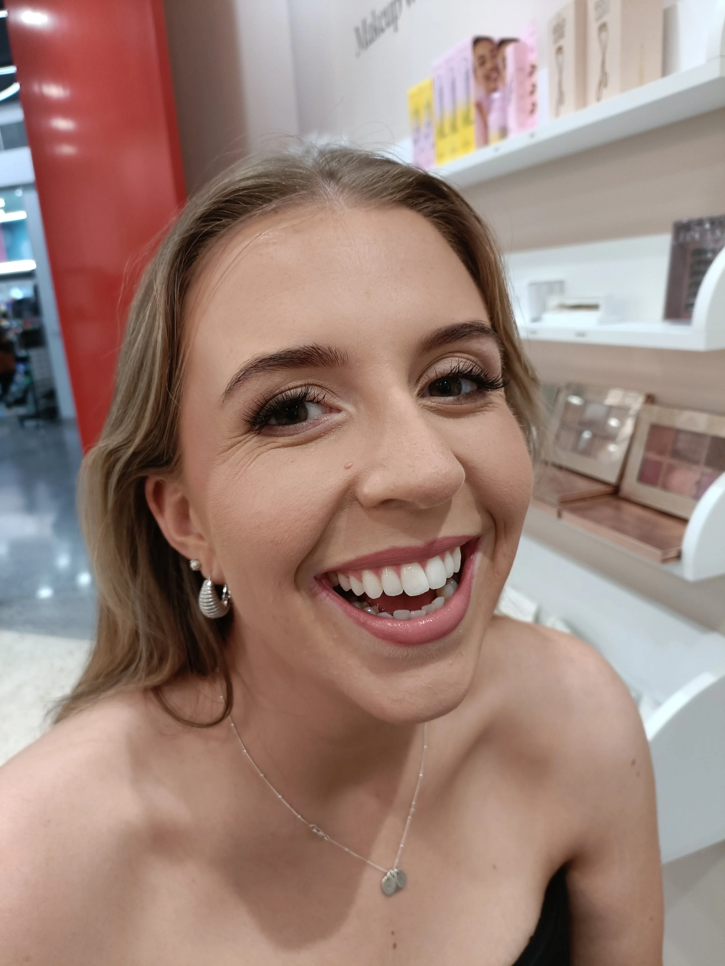 Girl in soft glam makeup inside The Lip Lab Perth