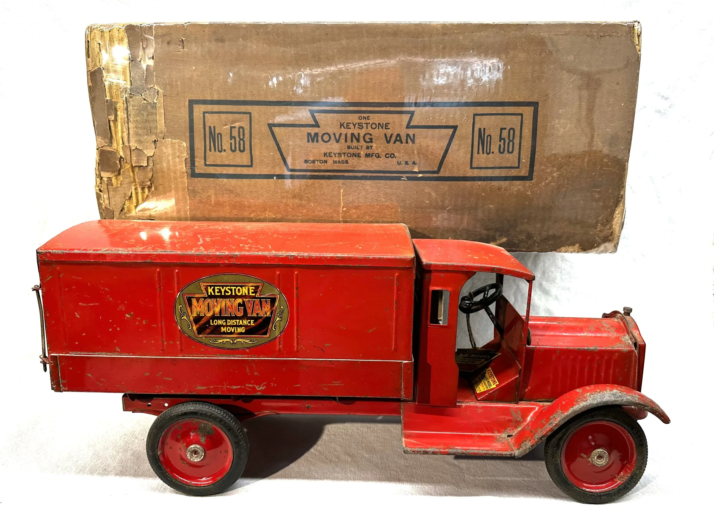 Boxed Keystone all red moving van.  This toy has a letter from the original family with the history of where it came from and who received it as a gift.