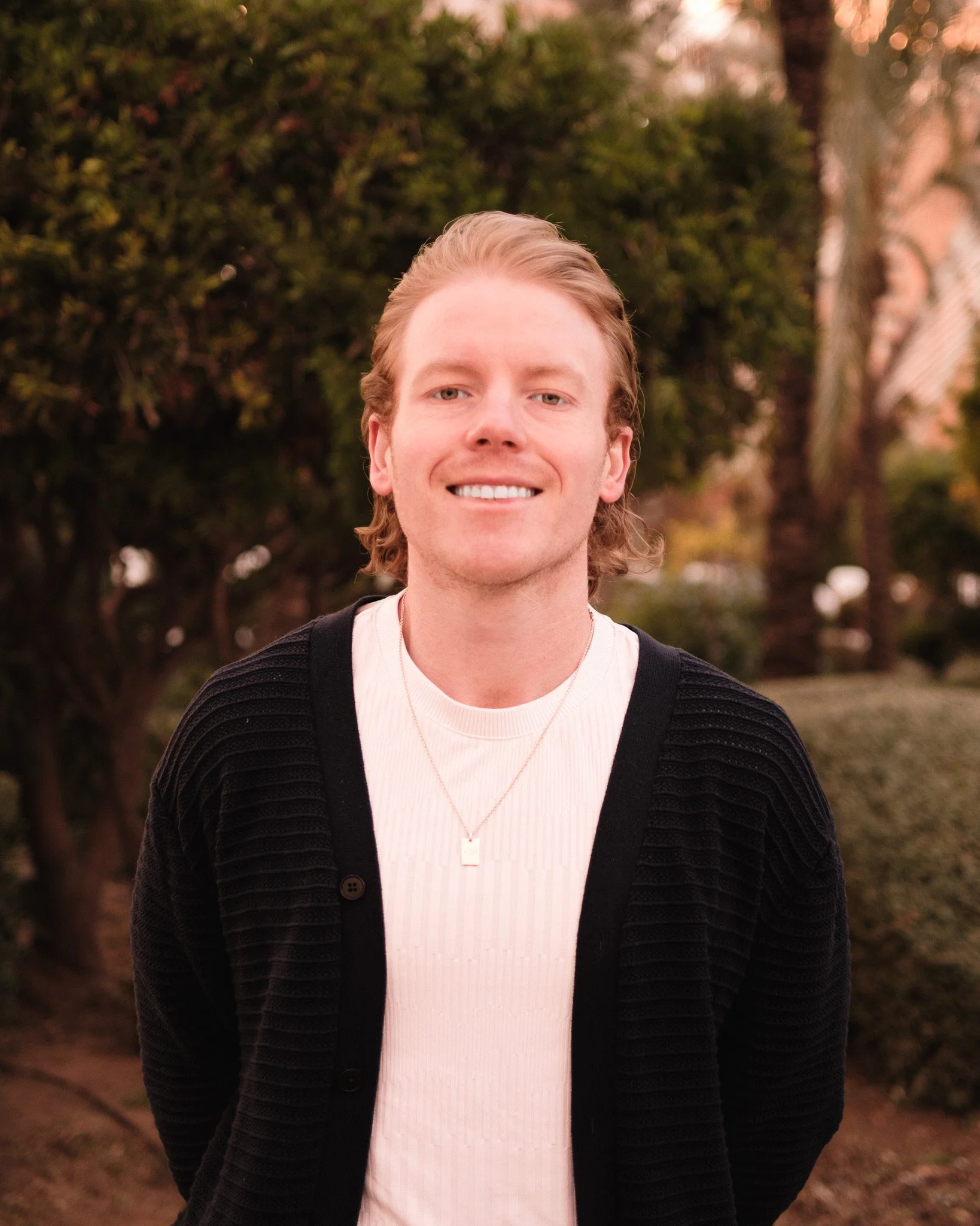 Russell Baxter, LPC-MHSP, smiling outdoors.