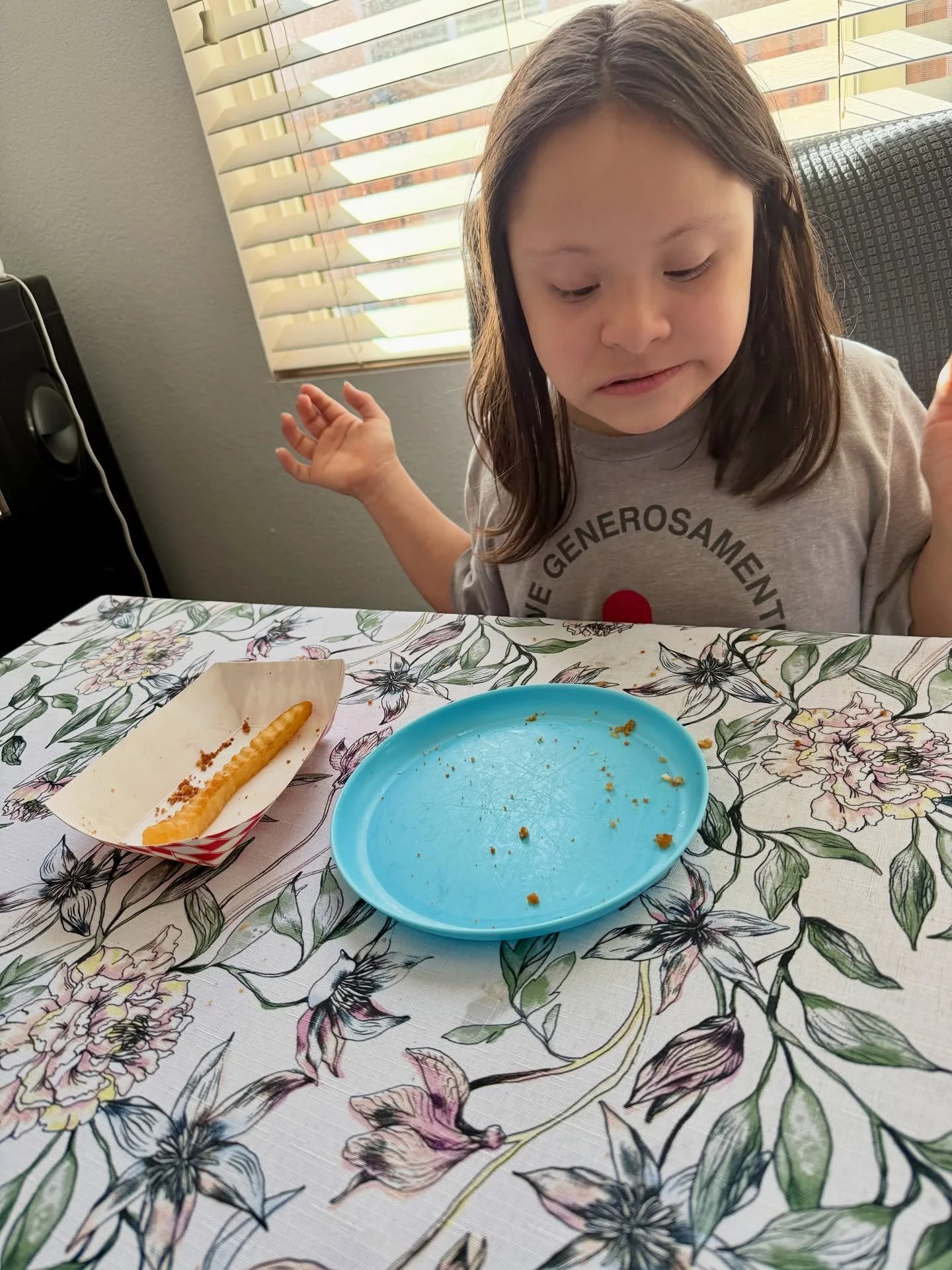 This was such a cute moment! 
Yesterday at lunch, we noticed Peanut pushed aside one last fry. The biggest one, of course!  We wondered if she was actually saving it. Sure enough, after finishing everything else, she looked at that last fry, smiled,