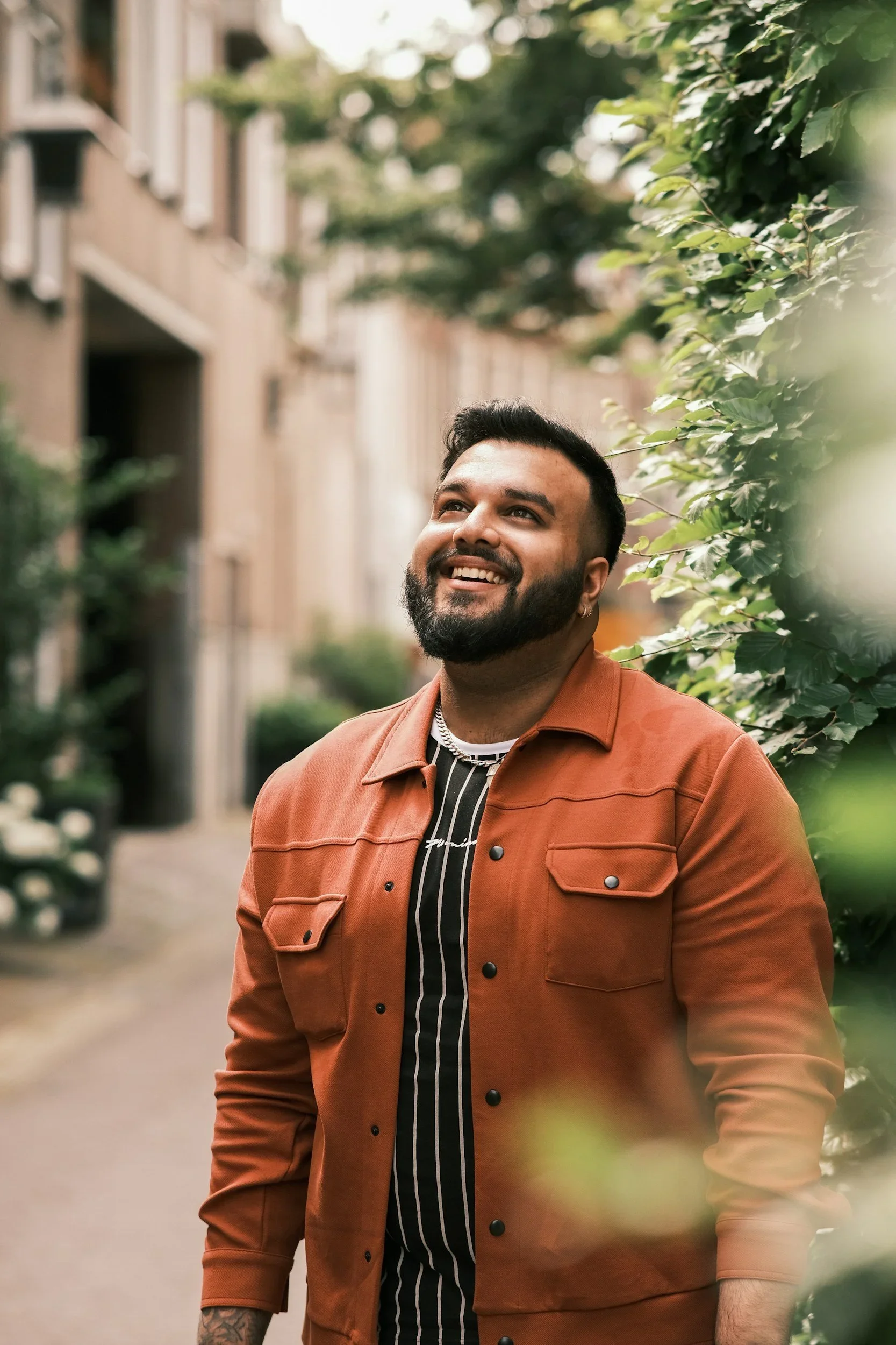 Man smiling outdoors on the EMDR Therapy page at Watershed Counseling