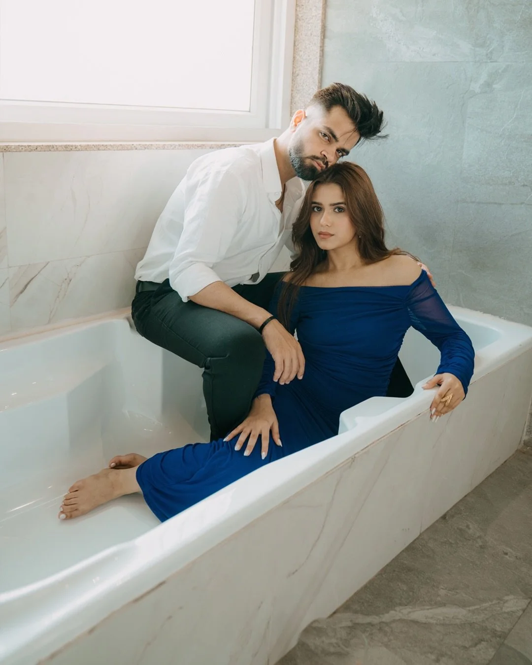 Some moments feel like they belong in a movie.
Soft light through the window, quiet music in the air, and two hearts completely lost in each other&rsquo;s presence. Nikita in elegant blue, Hiten with effortless charm &mdash; together they created a s
