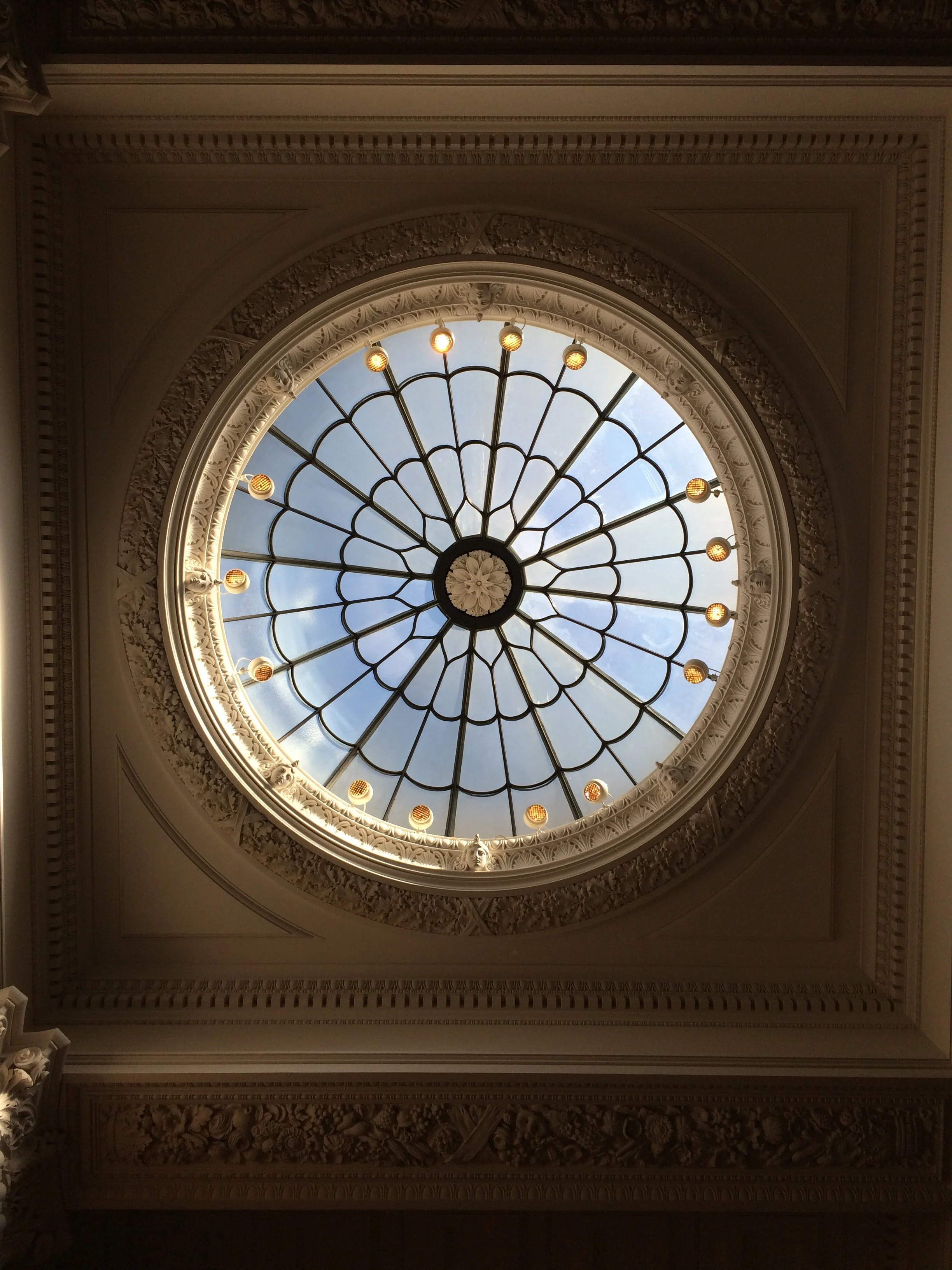 circular window with detailed moulding
