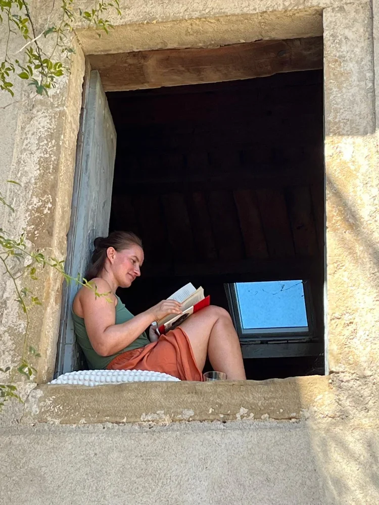 creative-sanctuary-reading-stone-window.webp